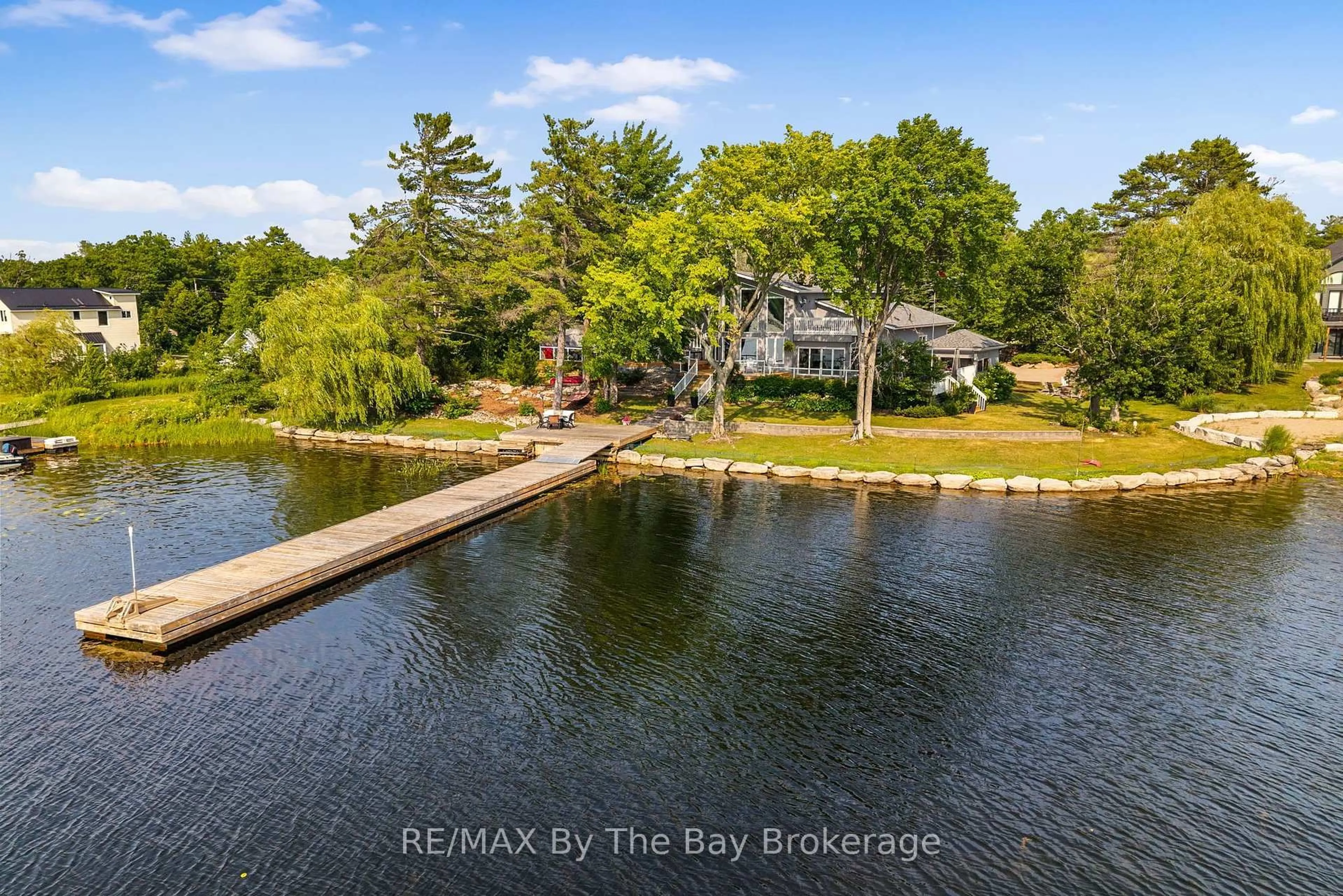 A pic from outside/outdoor area/front of a property/back of a property/a pic from drone, water/lake/river/ocean view for 156 Prisque Rd, Georgian Bay Ontario P0E 1E0