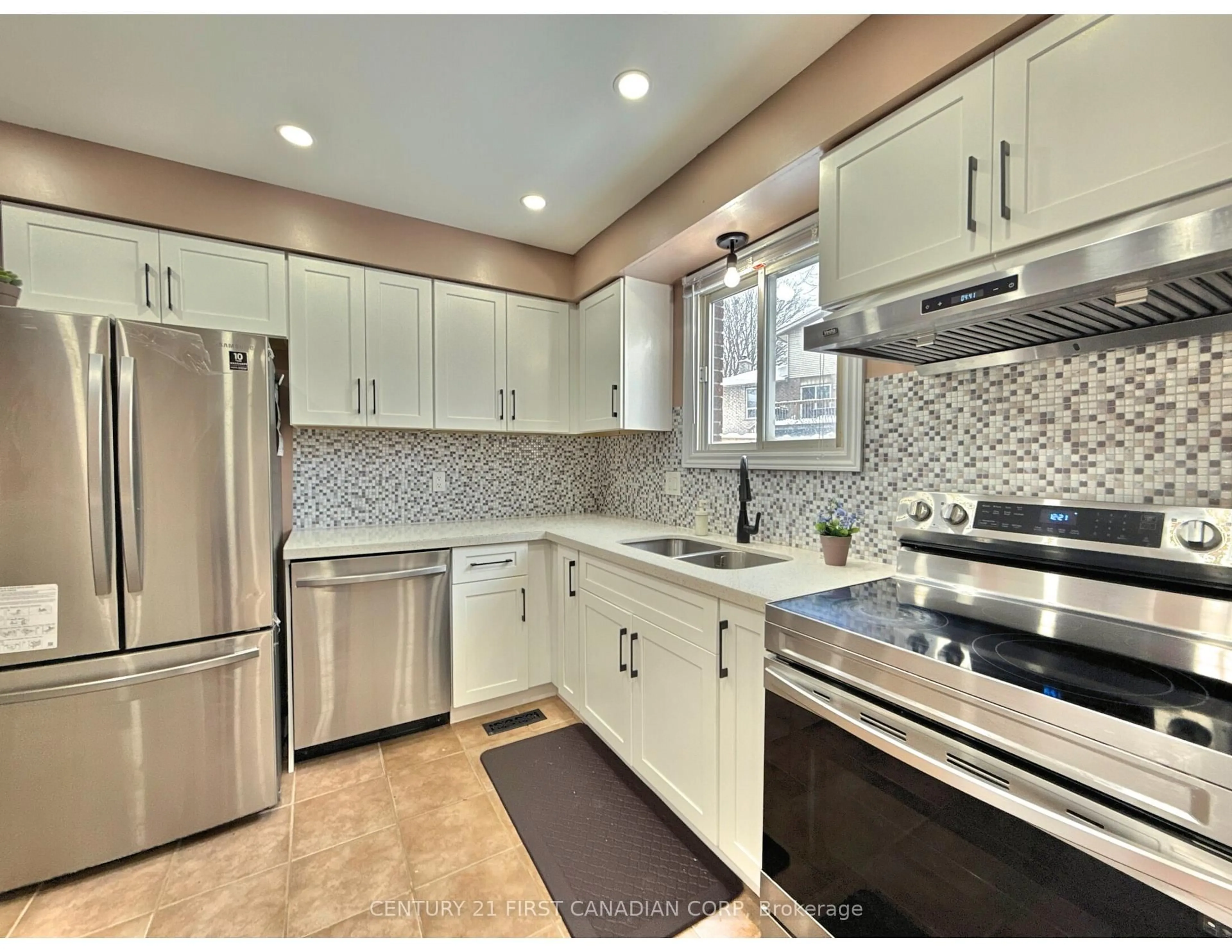 Open concept kitchen, ceramic/tile floor for 159 Walmer Gdns, London North Ontario N6G 4H6