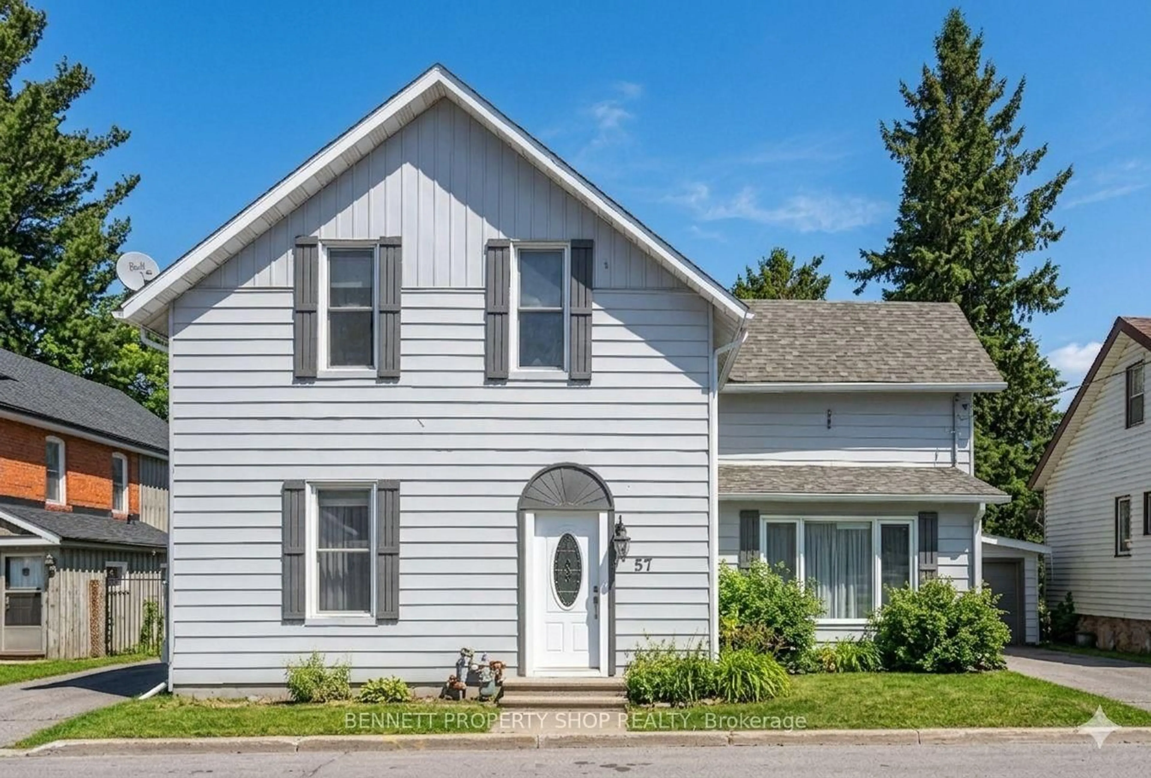 Home with vinyl exterior material, street for 57 Charles St, Carleton Place Ontario K7C 2Y2