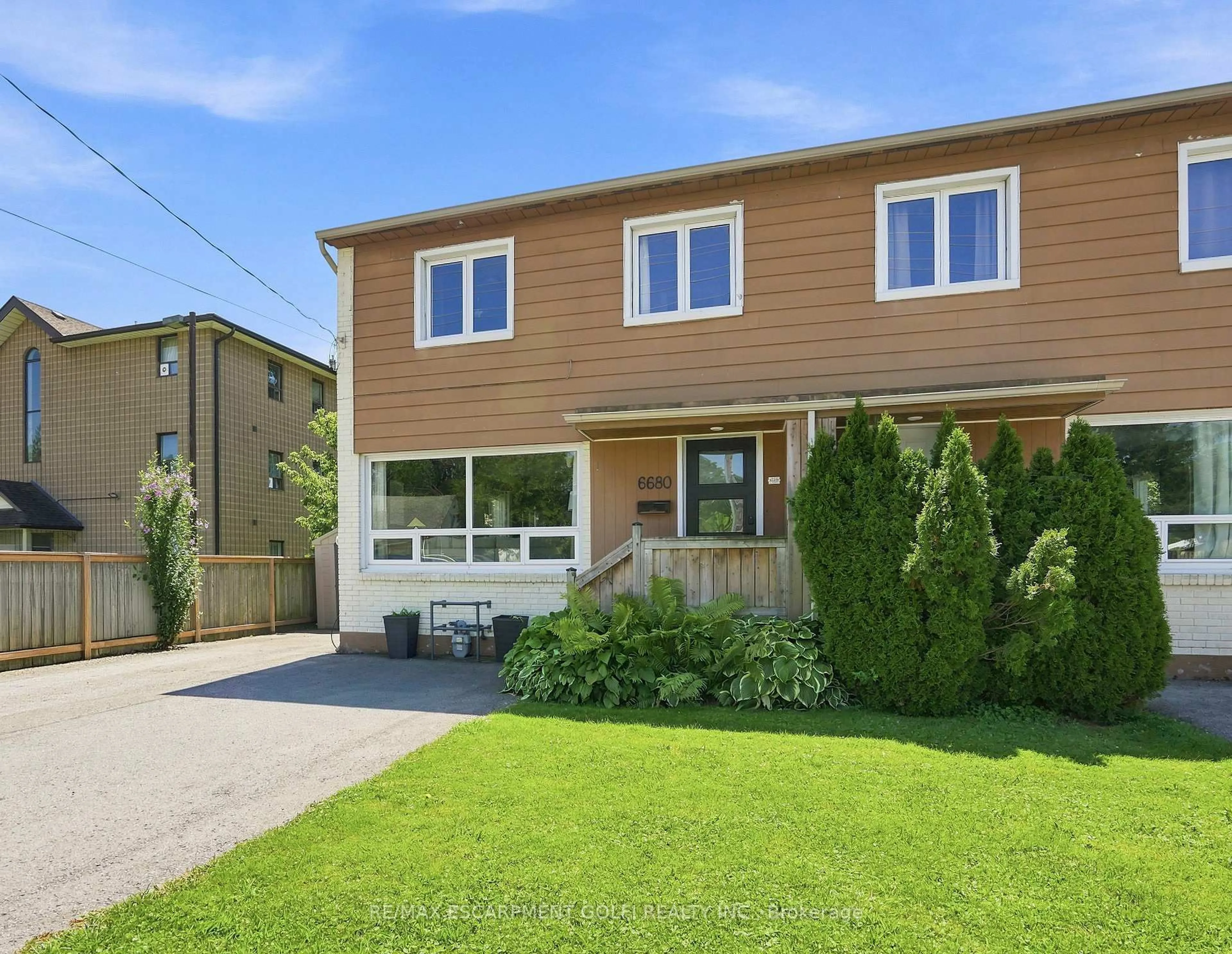 Home with vinyl exterior material, street for 6680 Mcleod Rd, Niagara Falls Ontario L2G 3G5