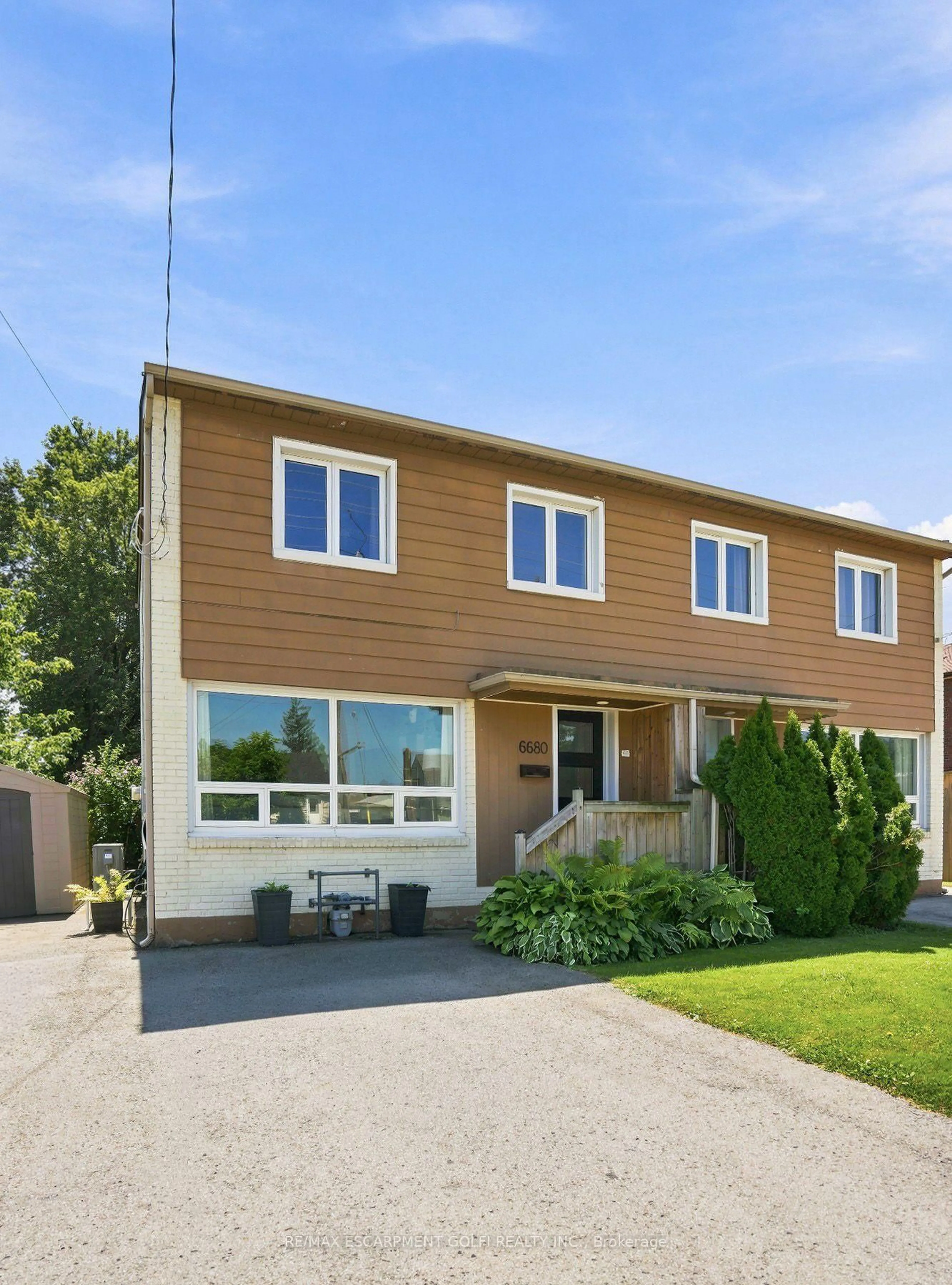 Home with vinyl exterior material, street for 6680 Mcleod Rd, Niagara Falls Ontario L2G 3G5
