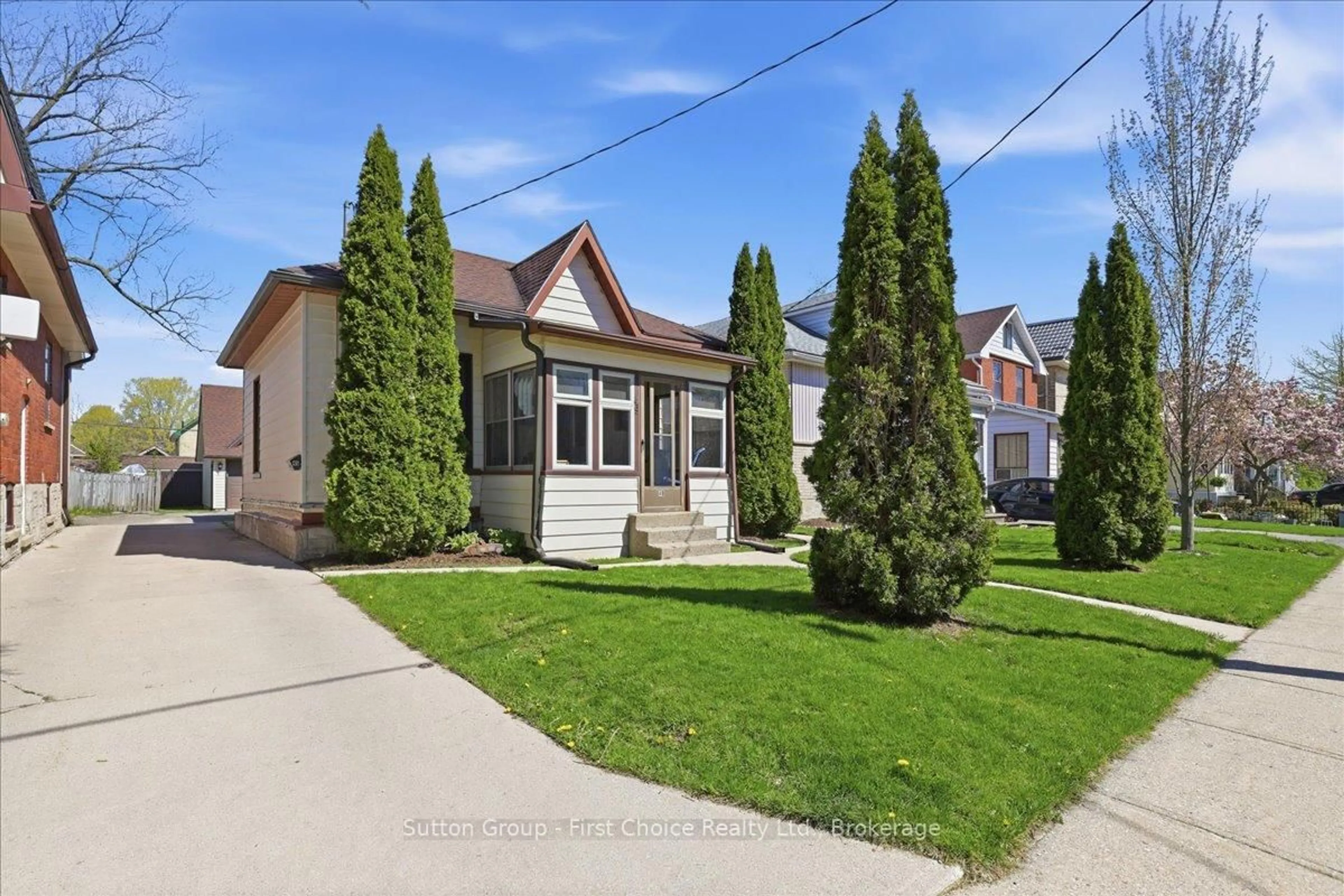Home with vinyl exterior material, street for 49 Well St, Stratford Ontario N5A 4L8