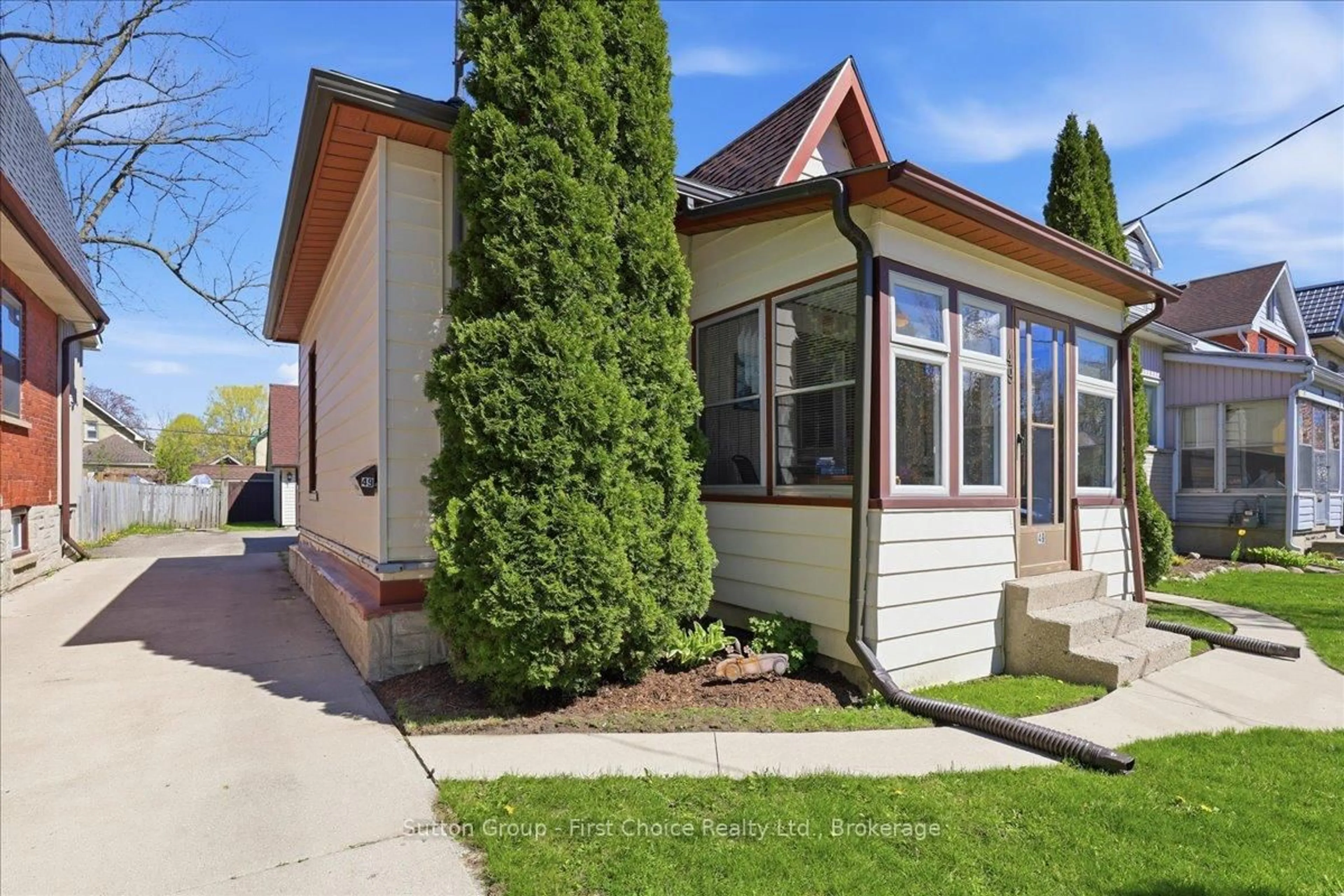 Home with vinyl exterior material, street for 49 Well St, Stratford Ontario N5A 4L8