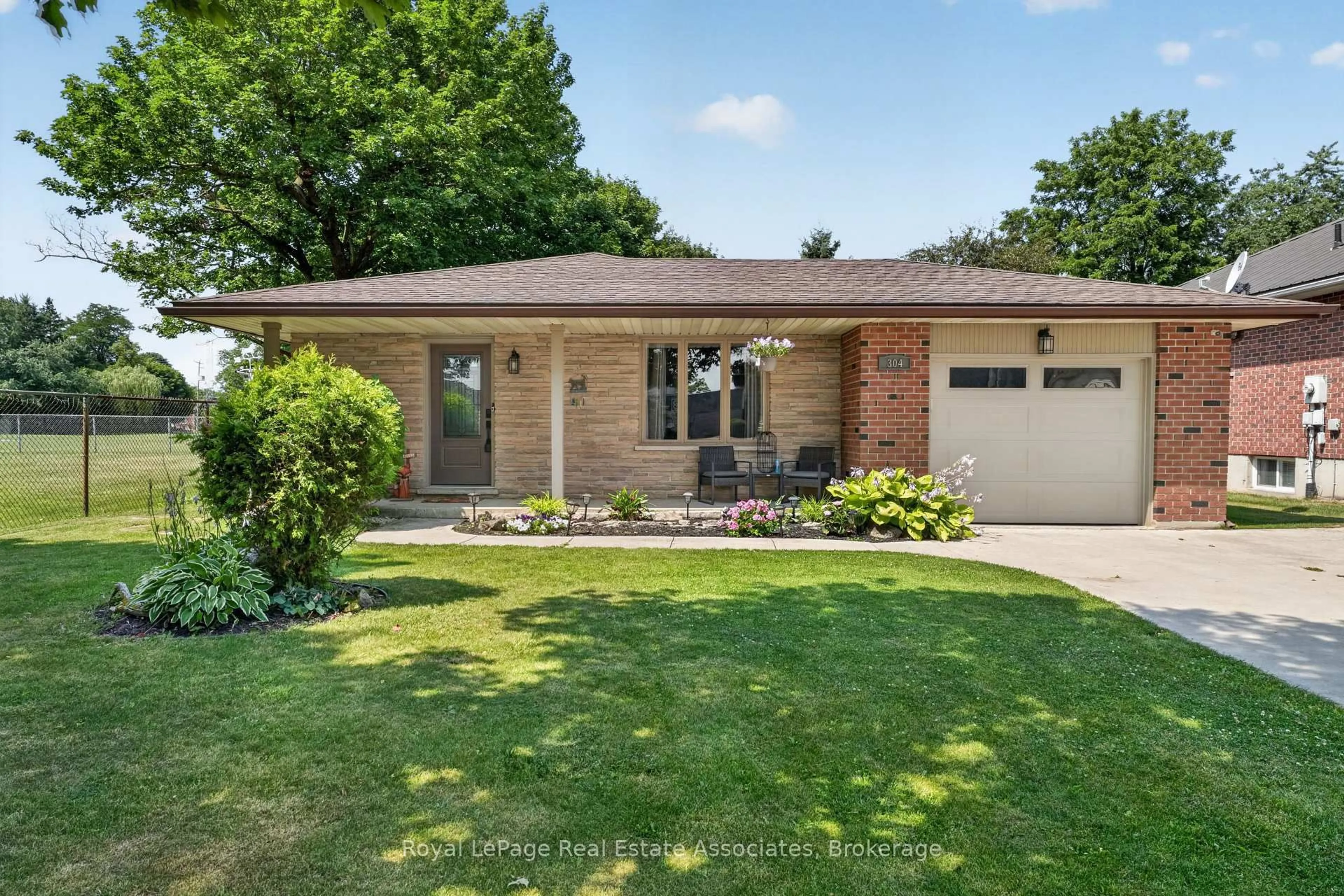 Home with brick exterior material, street for 304 ELIZA St, Wellington North Ontario N0G 1A0