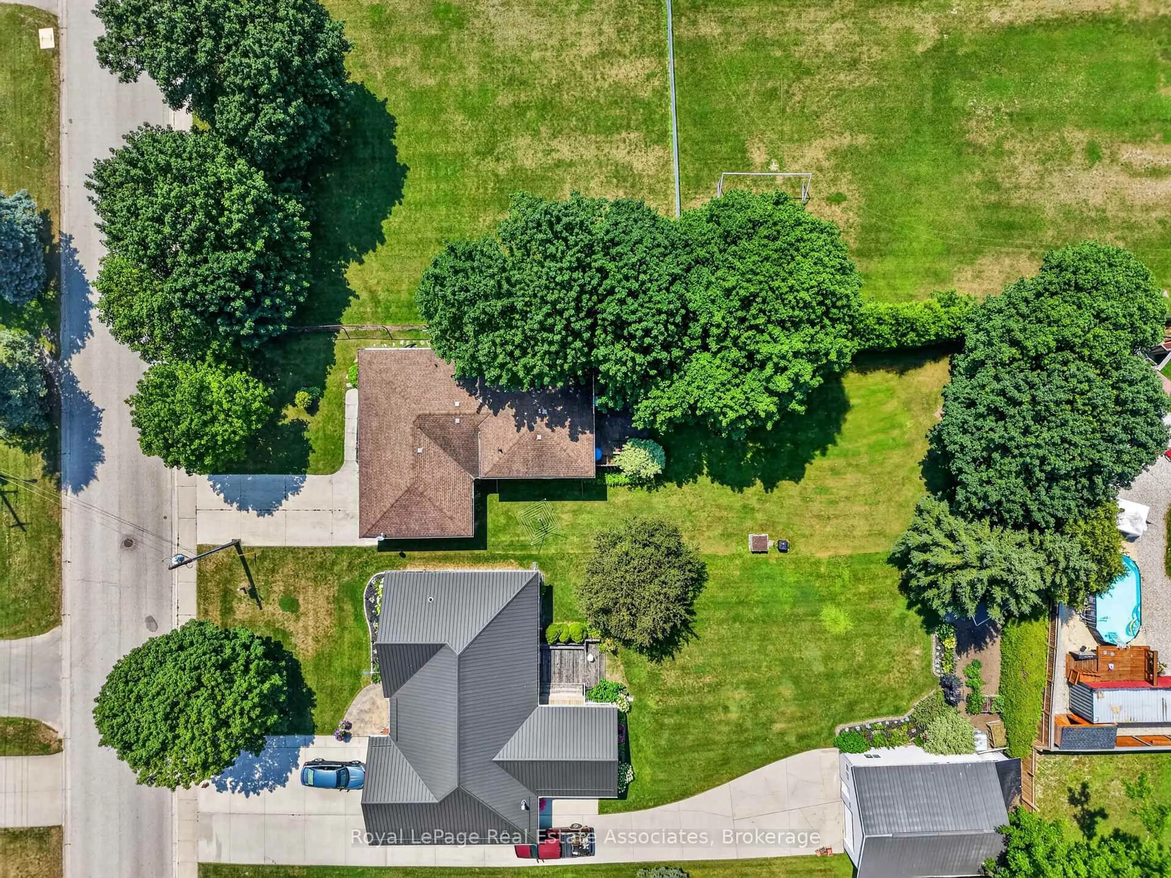 A pic from outside/outdoor area/front of a property/back of a property/a pic from drone, street for 304 ELIZA St, Wellington North Ontario N0G 1A0