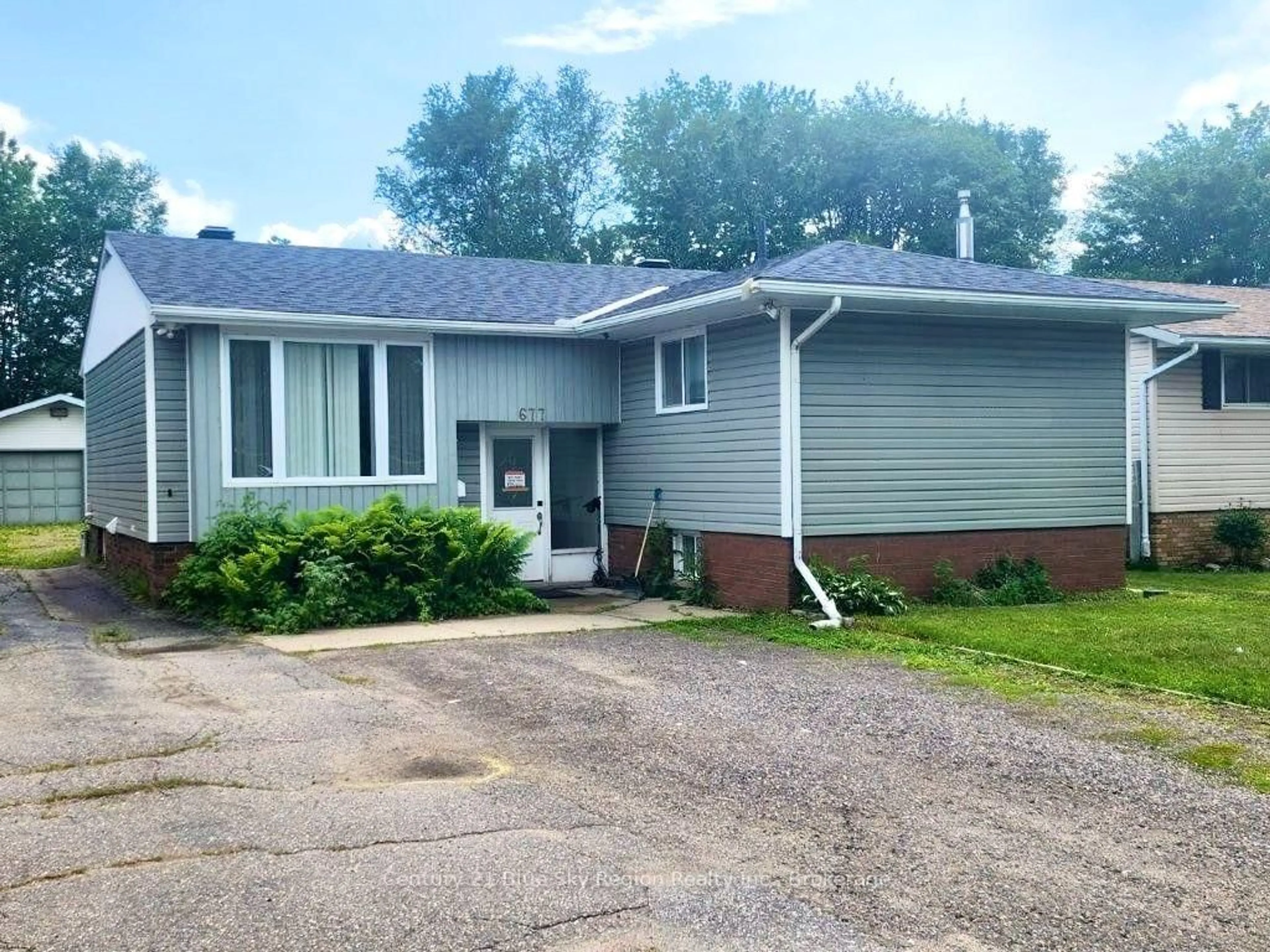 Home with vinyl exterior material, street for 677 Tackaberry Dr, North Bay Ontario P1B 8R1