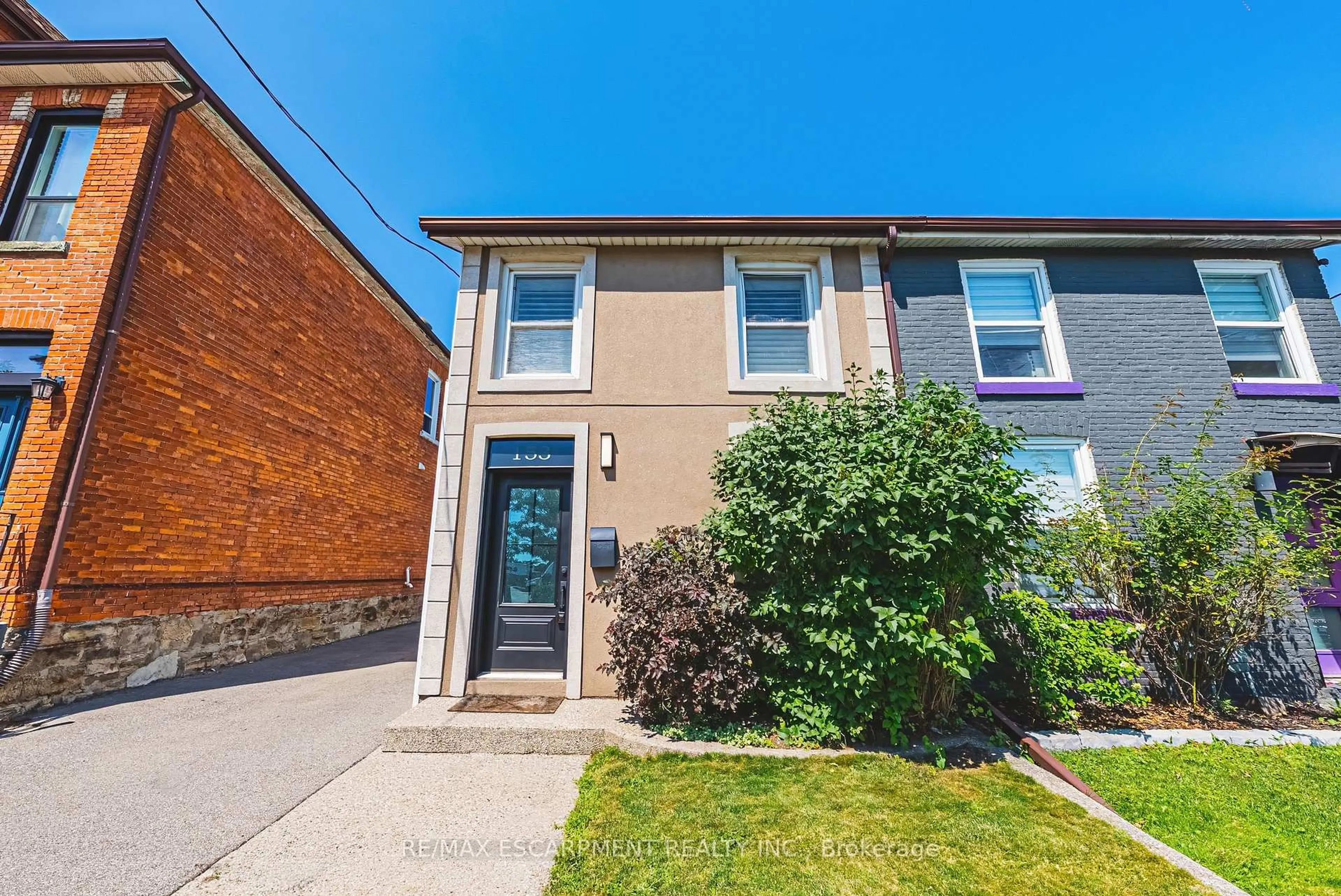 Home with brick exterior material, street for 153 Elgin St, Hamilton Ontario L8L 4Y1