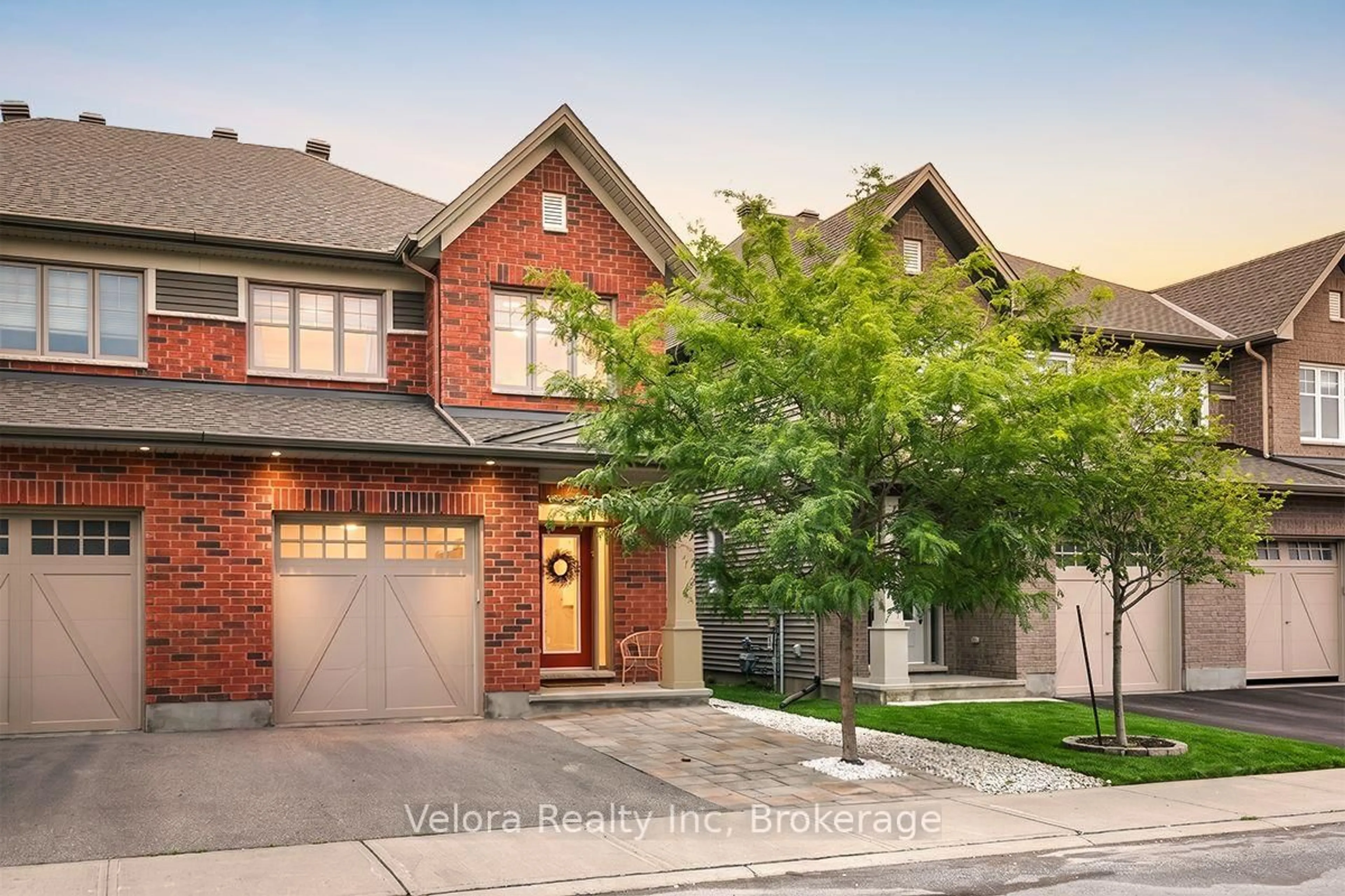 Home with brick exterior material, street for 424 Warmstone Dr, Stittsville Ontario K2S 0W2