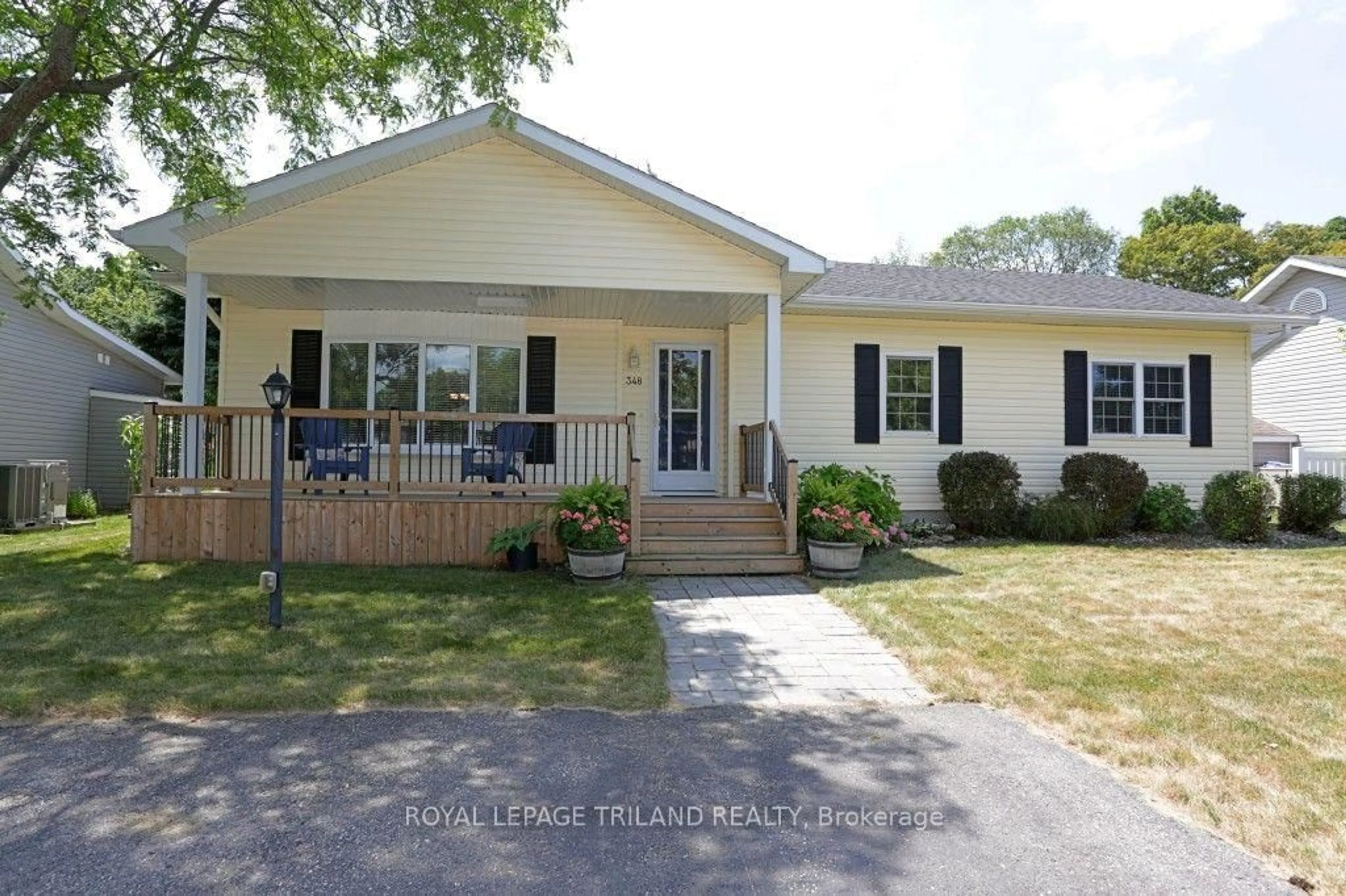 Home with vinyl exterior material, street for 348 Shannon Blvd, South Huron Ontario N0M 1T0