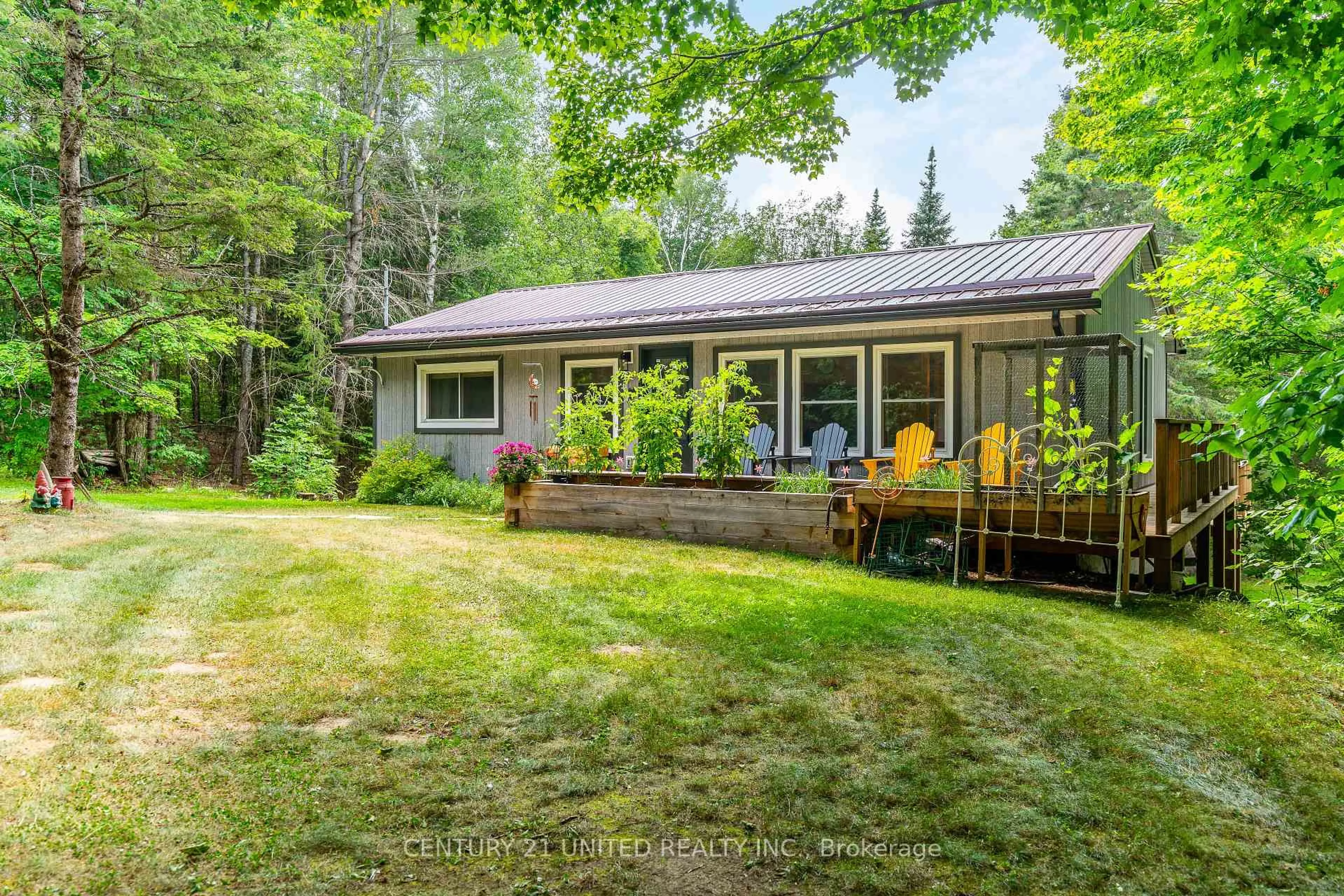Patio, forest/trees view for 1001 English Circ, Highlands East Ontario K0M 1R0
