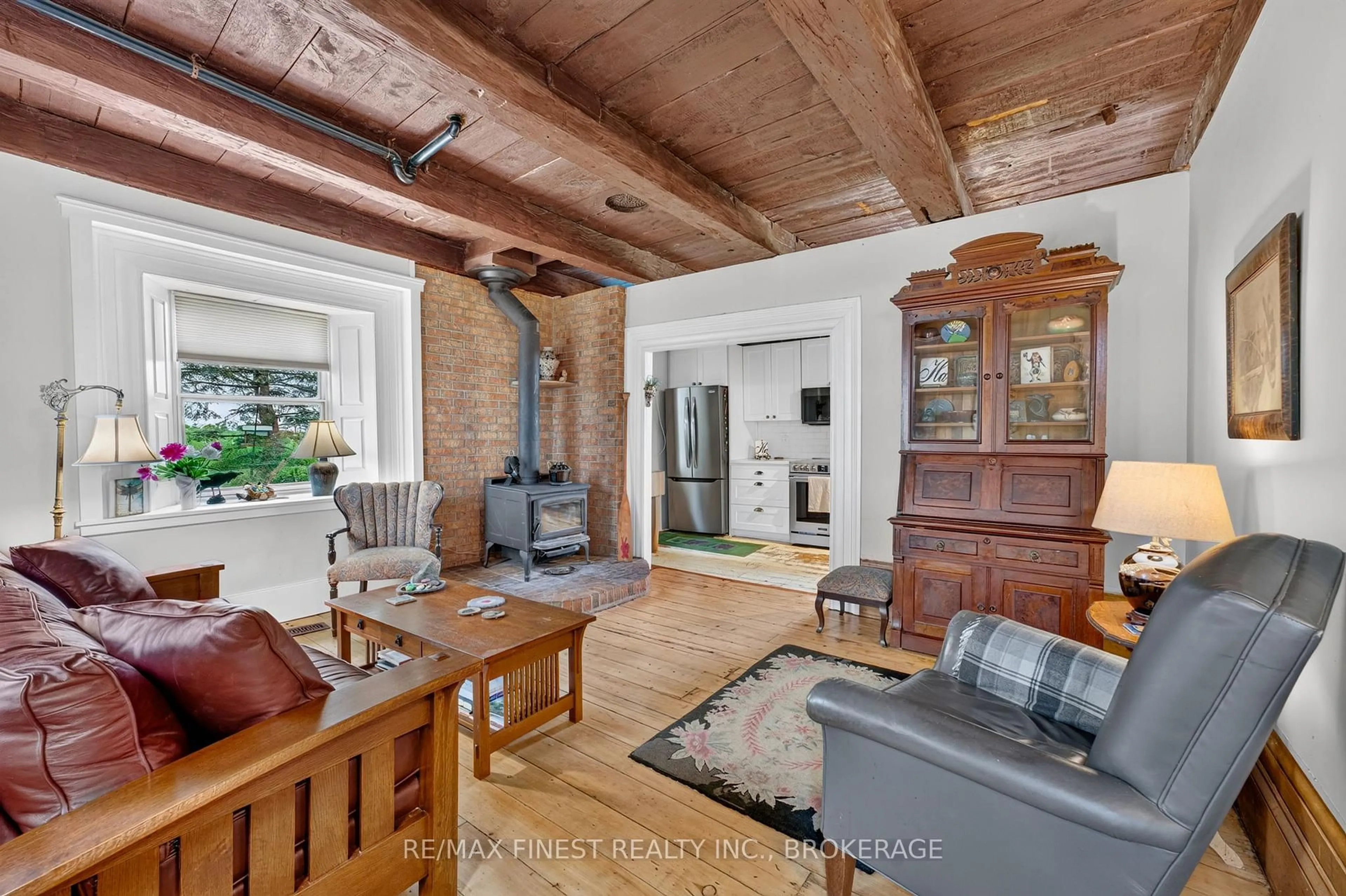 Living room with furniture, wood/laminate floor for 1158 County Road 27, Newburgh Ontario K0K 2S0