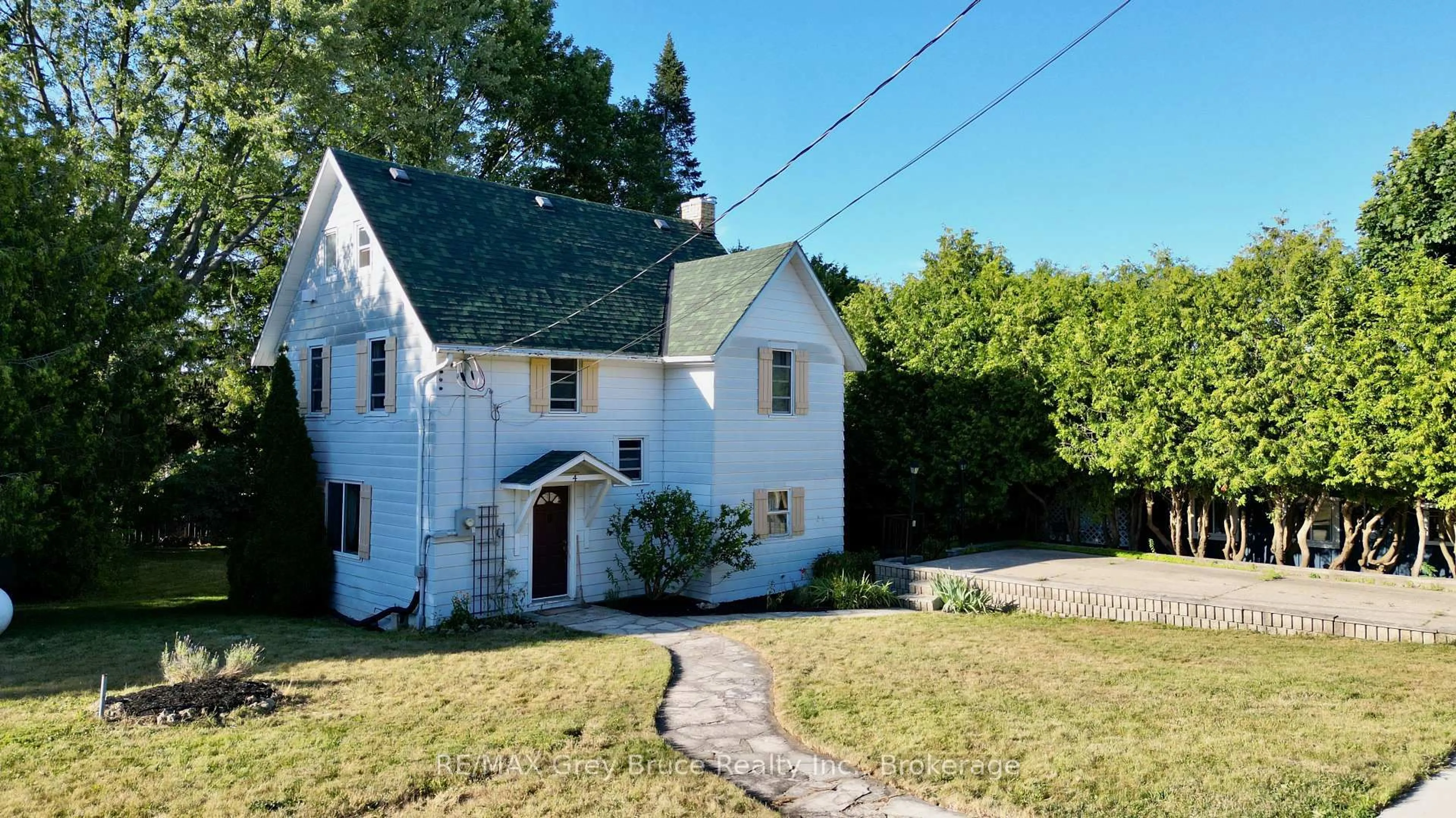 A pic from outside/outdoor area/front of a property/back of a property/a pic from drone, street for 4 Mill St, Northern Bruce Peninsula Ontario N0H 1W0