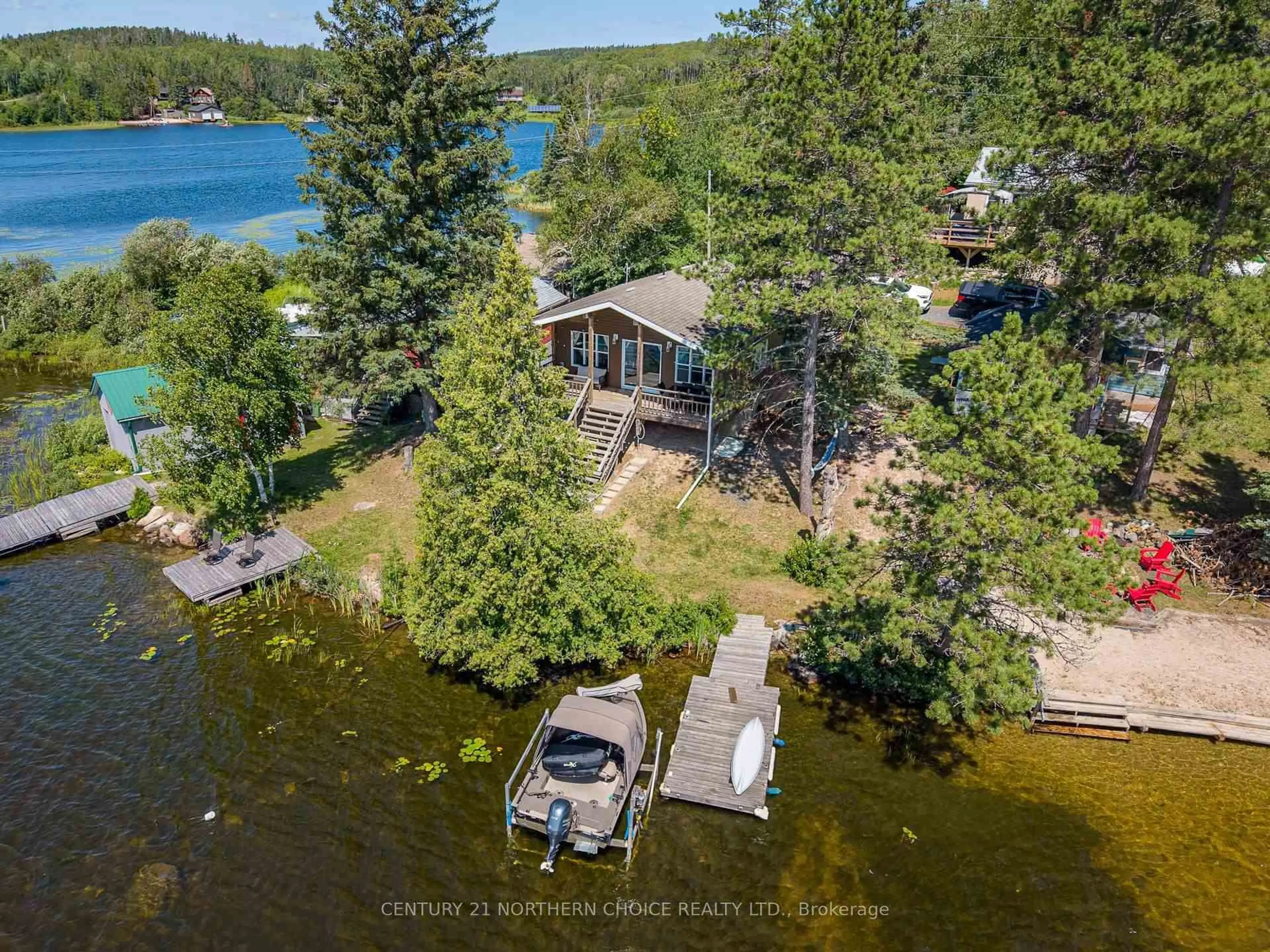 A pic from outside/outdoor area/front of a property/back of a property/a pic from drone, water/lake/river/ocean view for 80 BAY POINT Rd, Kenora Ontario P0X 1H0