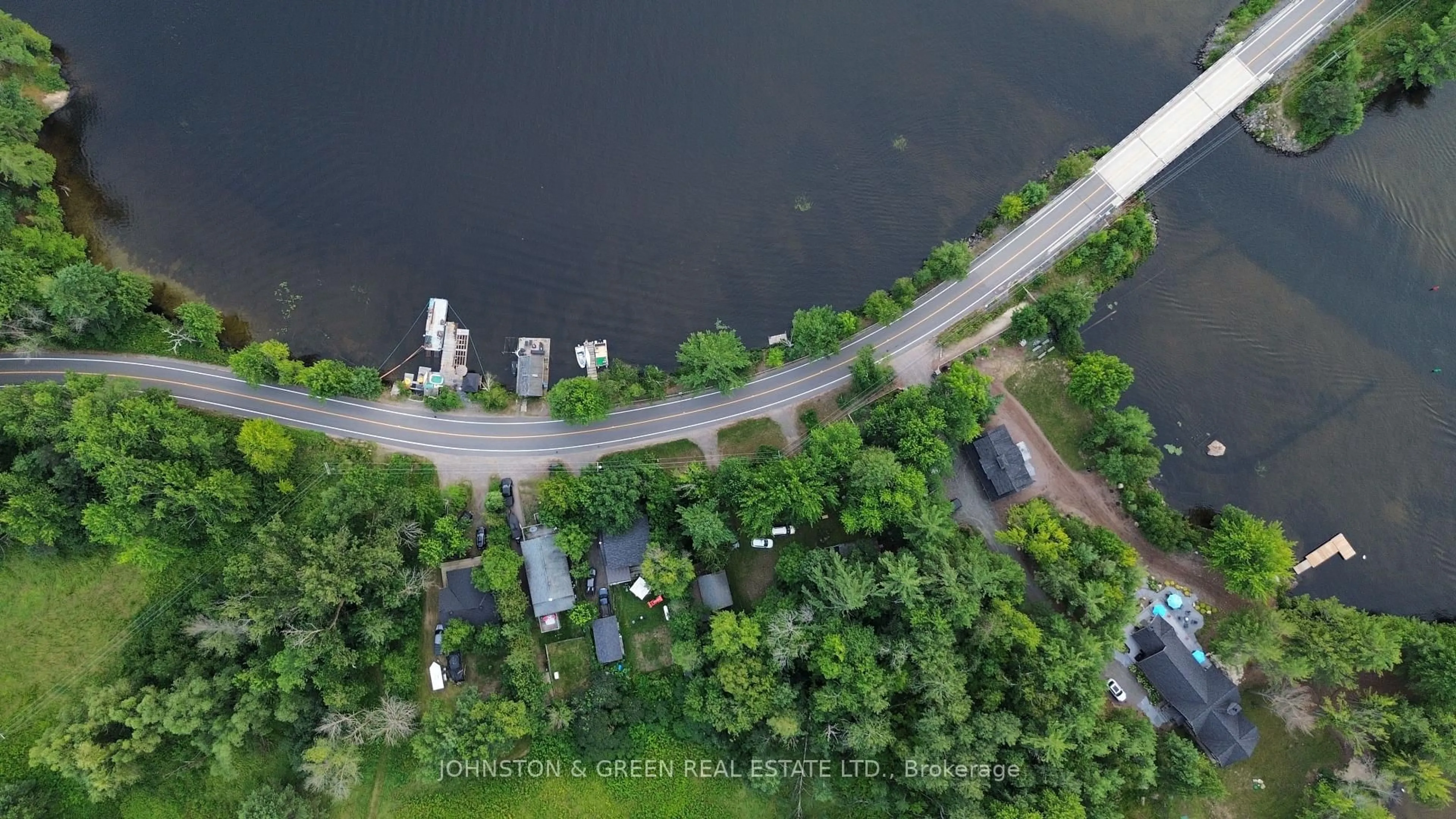 A pic from outside/outdoor area/front of a property/back of a property/a pic from drone, water/lake/river/ocean view for 1110-1112 Beaumaris Rd, Muskoka Lakes Ontario P1L 0M8