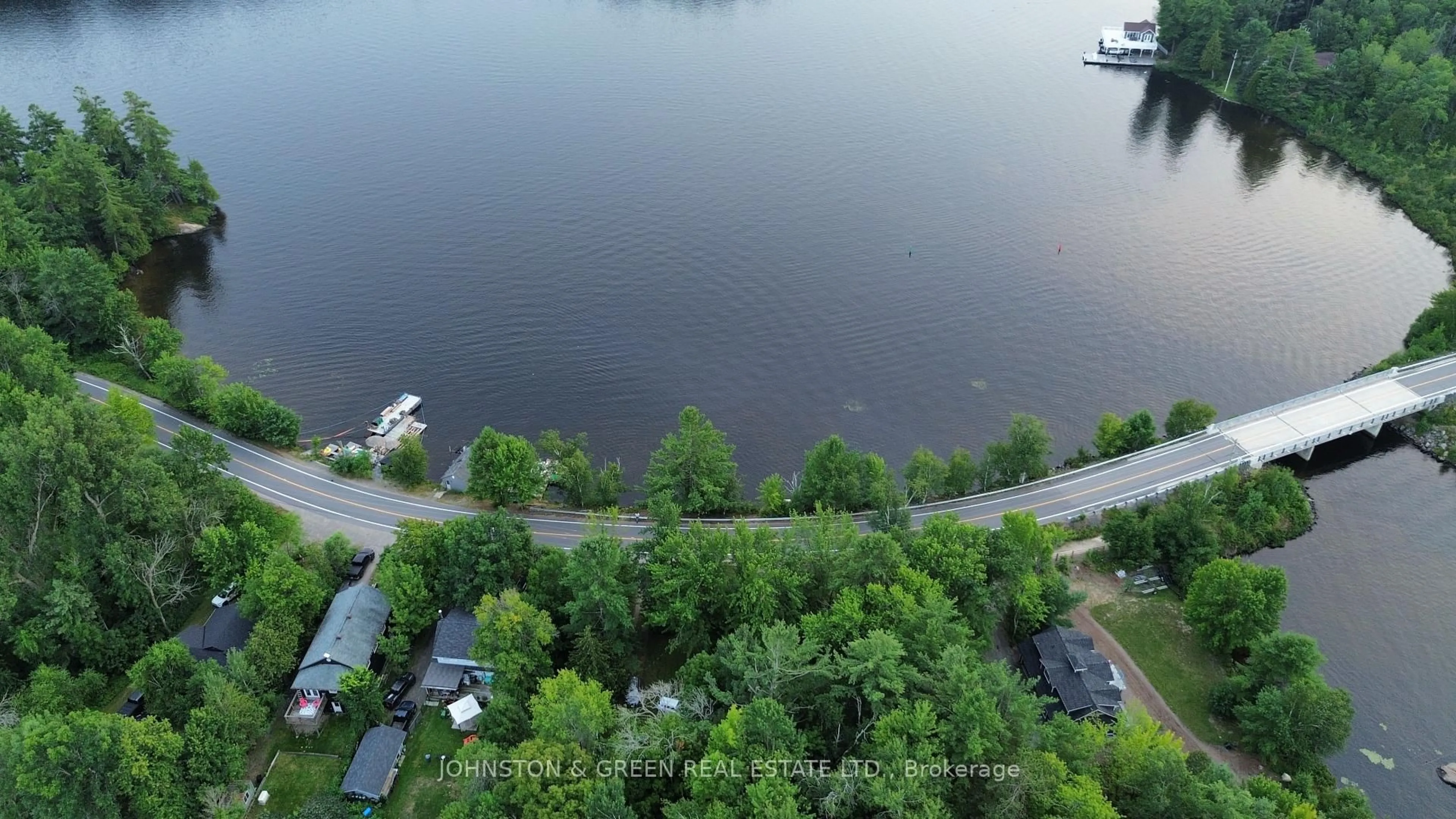 A pic from outside/outdoor area/front of a property/back of a property/a pic from drone, water/lake/river/ocean view for 1110-1112 Beaumaris Rd, Muskoka Lakes Ontario P1L 0M8