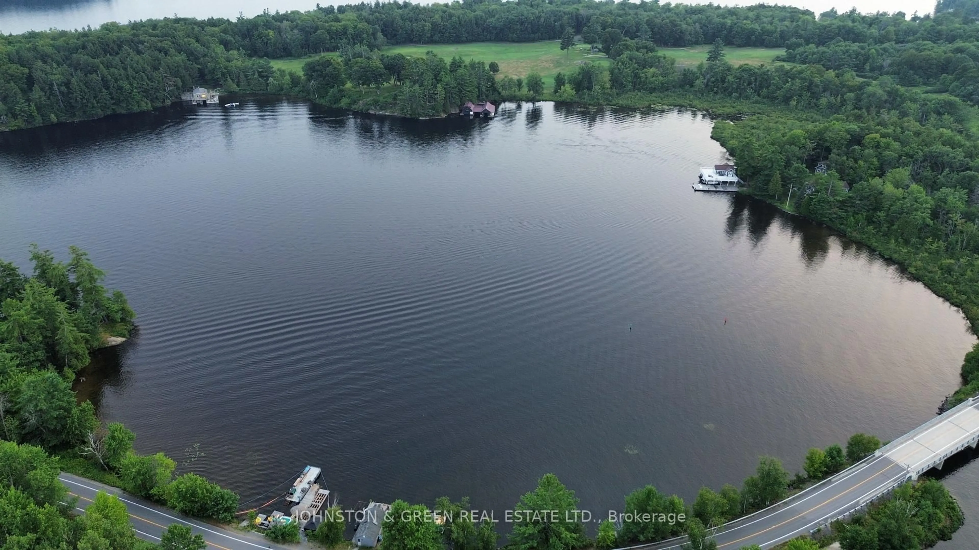 A pic from outside/outdoor area/front of a property/back of a property/a pic from drone, water/lake/river/ocean view for 1110-1112 Beaumaris Rd, Muskoka Lakes Ontario P1L 0M8