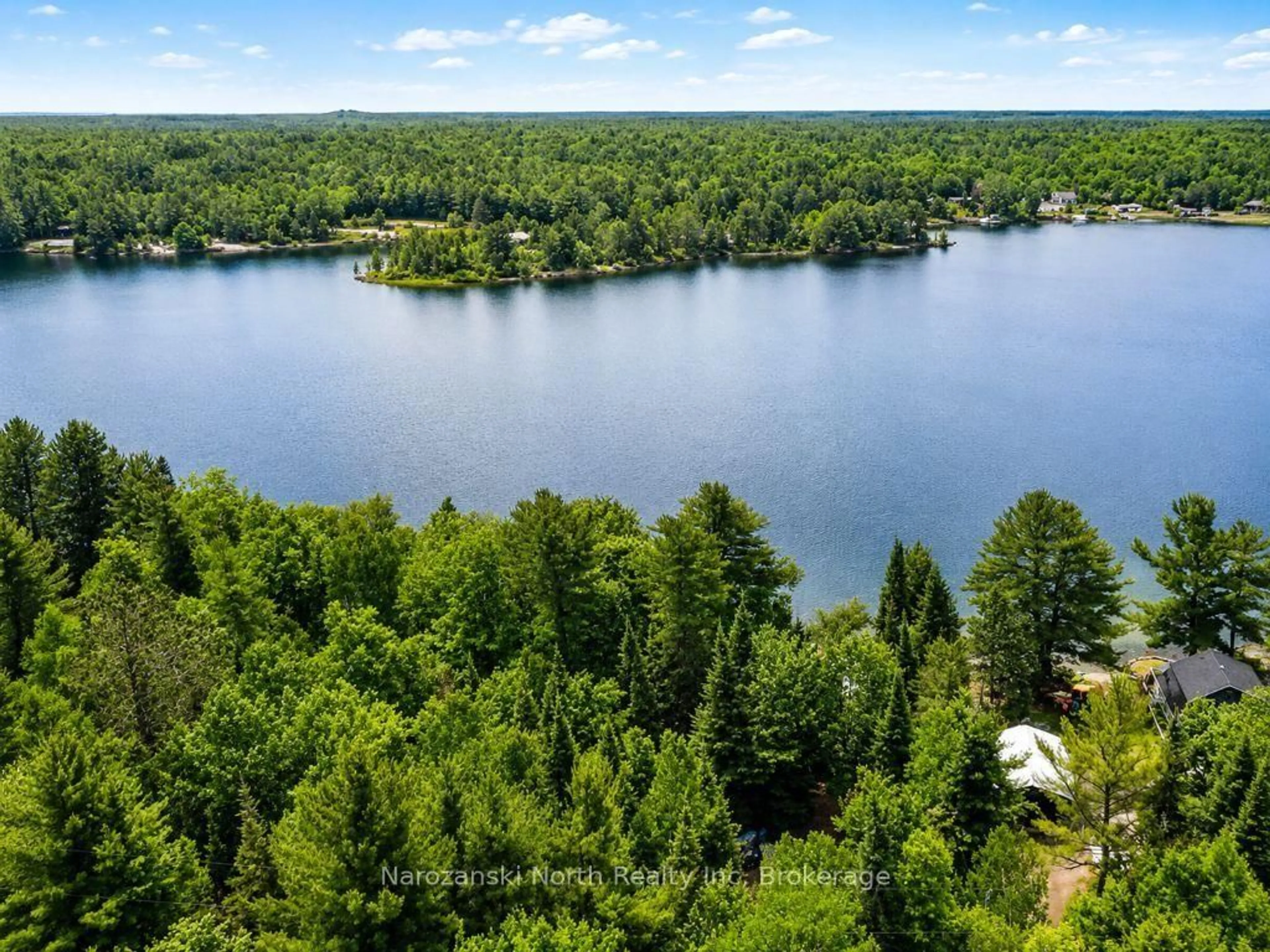 A pic from outside/outdoor area/front of a property/back of a property/a pic from drone, water/lake/river/ocean view for 98 West Ham Lake Rd, Killarney Ontario P0M 1A0