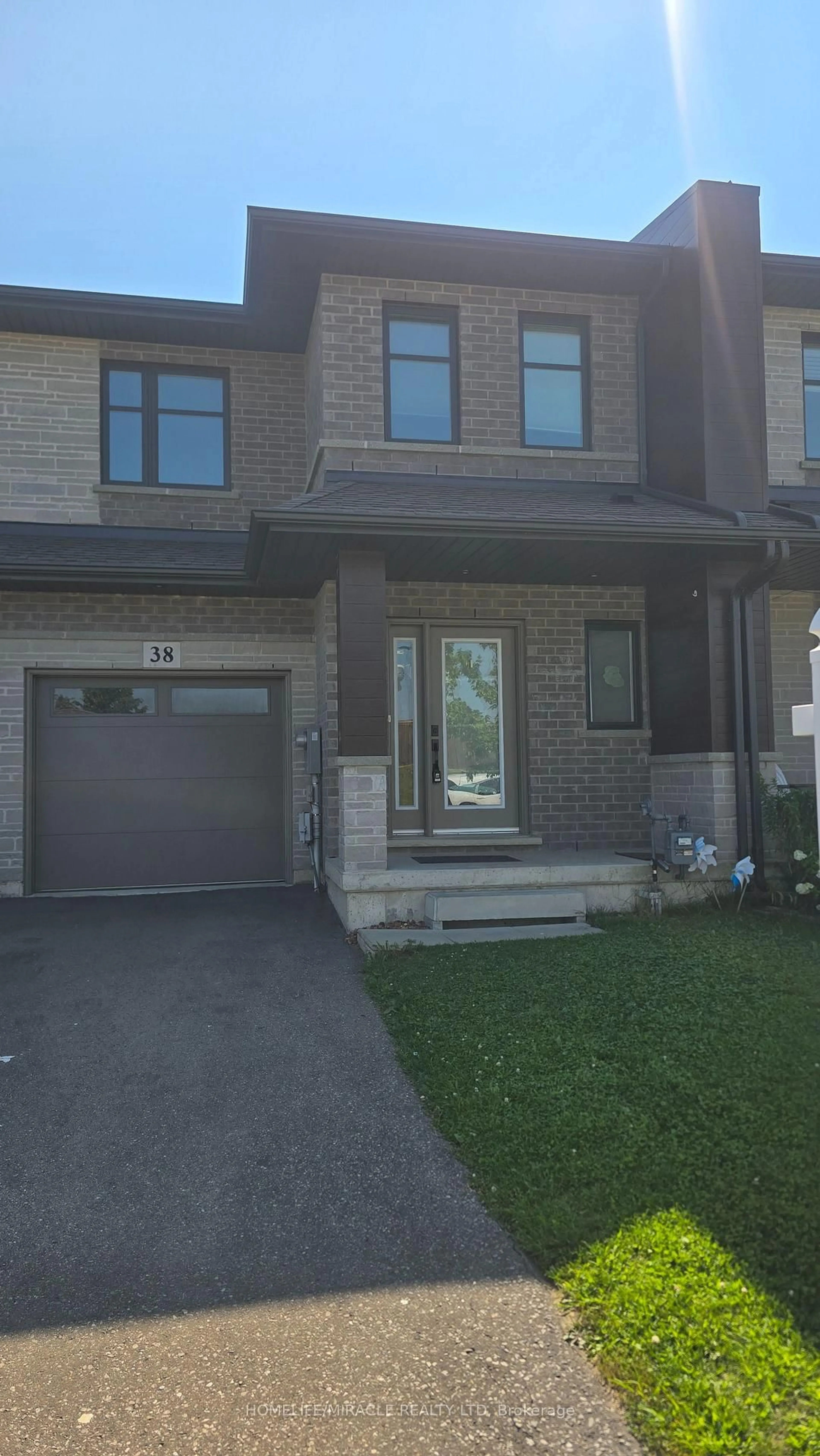 Home with brick exterior material, street for 38 Jayla Lane, West Lincoln Ontario L0R 2A0