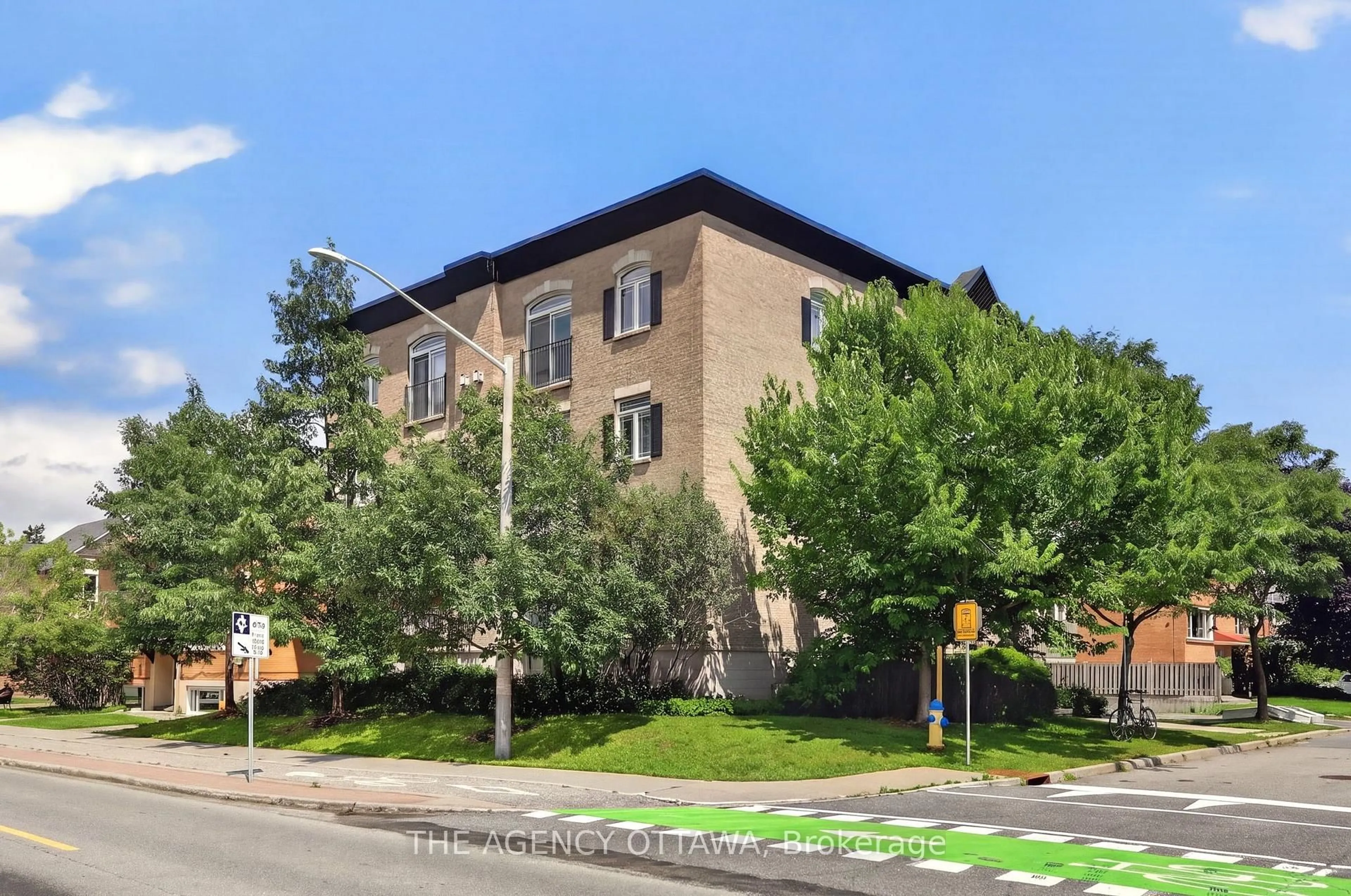 Home with brick exterior material, street for 711 Churchill Ave #203, Ottawa Ontario K1Z 7J9