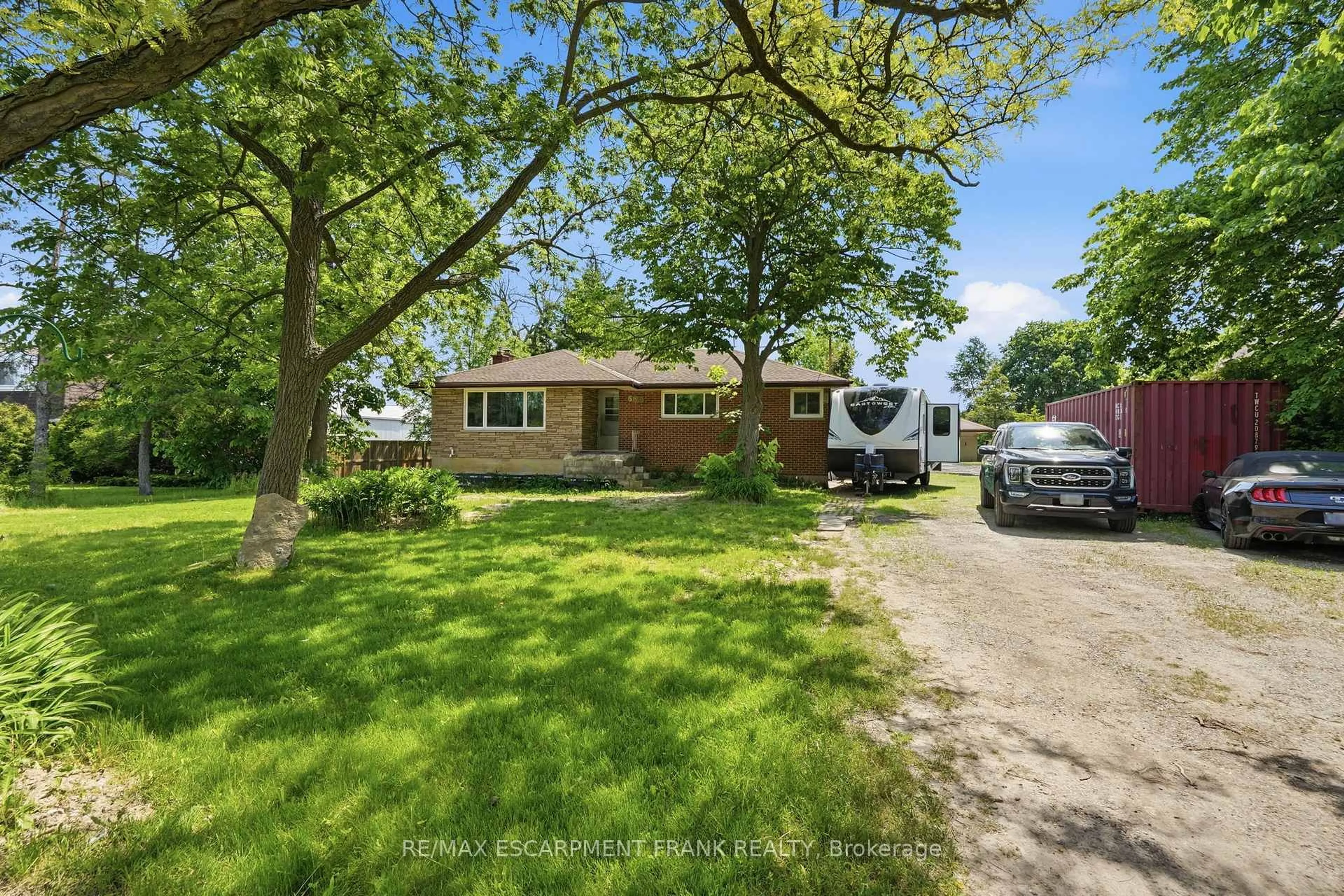 A pic from outside/outdoor area/front of a property/back of a property/a pic from drone, street for 589 Glover Rd, Hamilton Ontario L0R 1P0