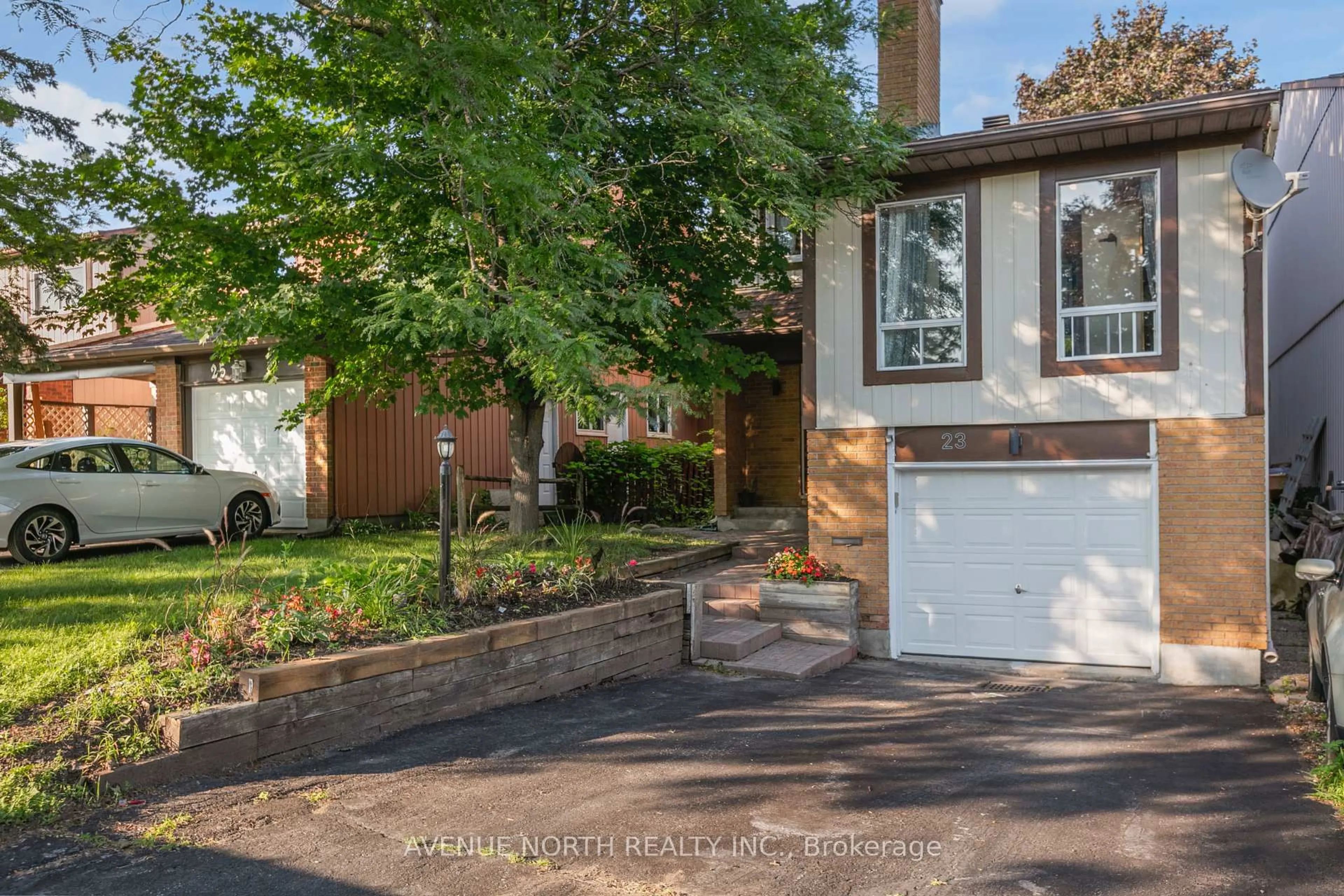 Home with brick exterior material, street for 23 Bluegrass Dr, Ottawa Ontario K2M 1G2