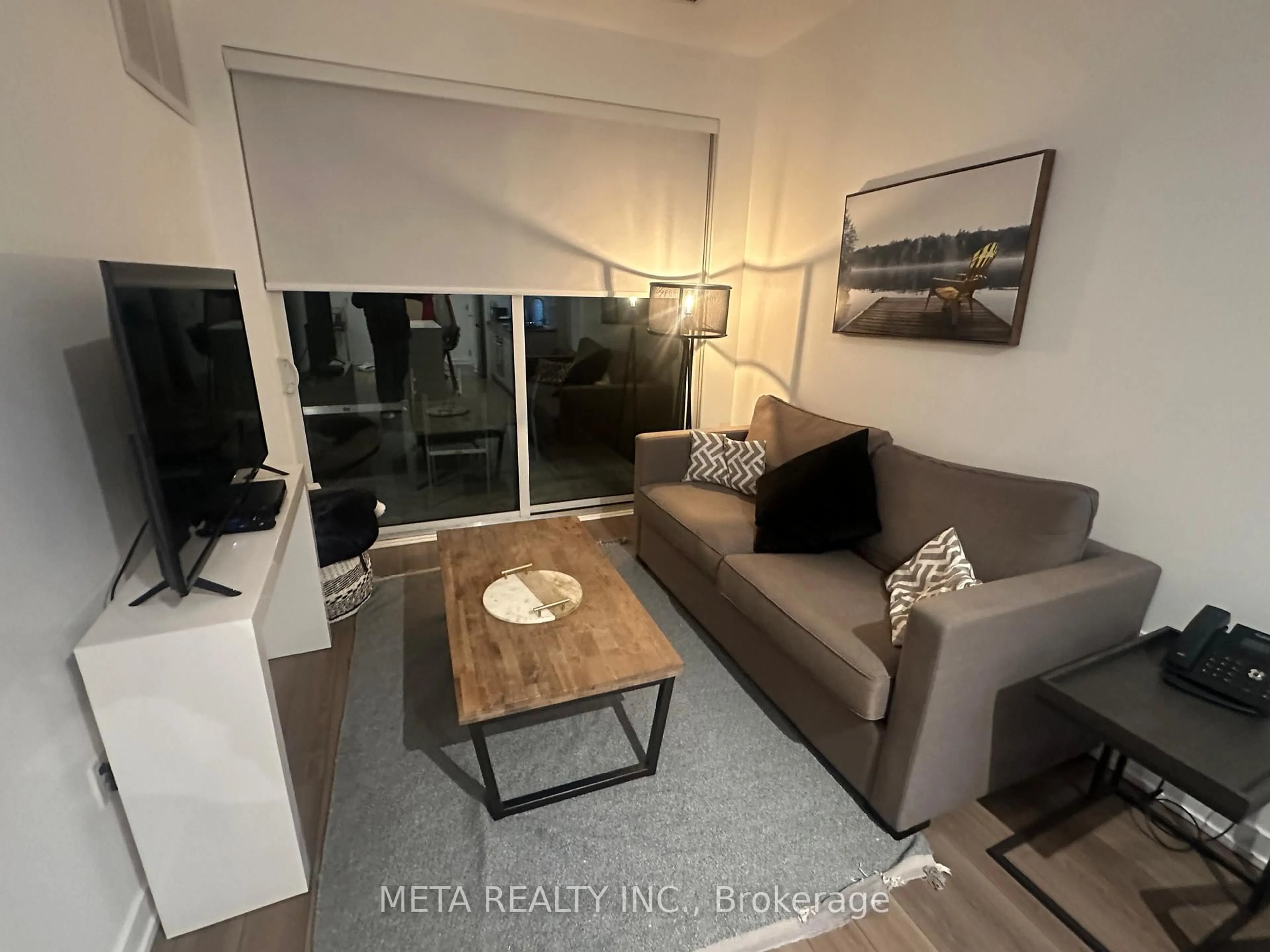 Living room with furniture, unknown for 120 Carrick Tr #107, Gravenhurst Ontario P1P 0A1