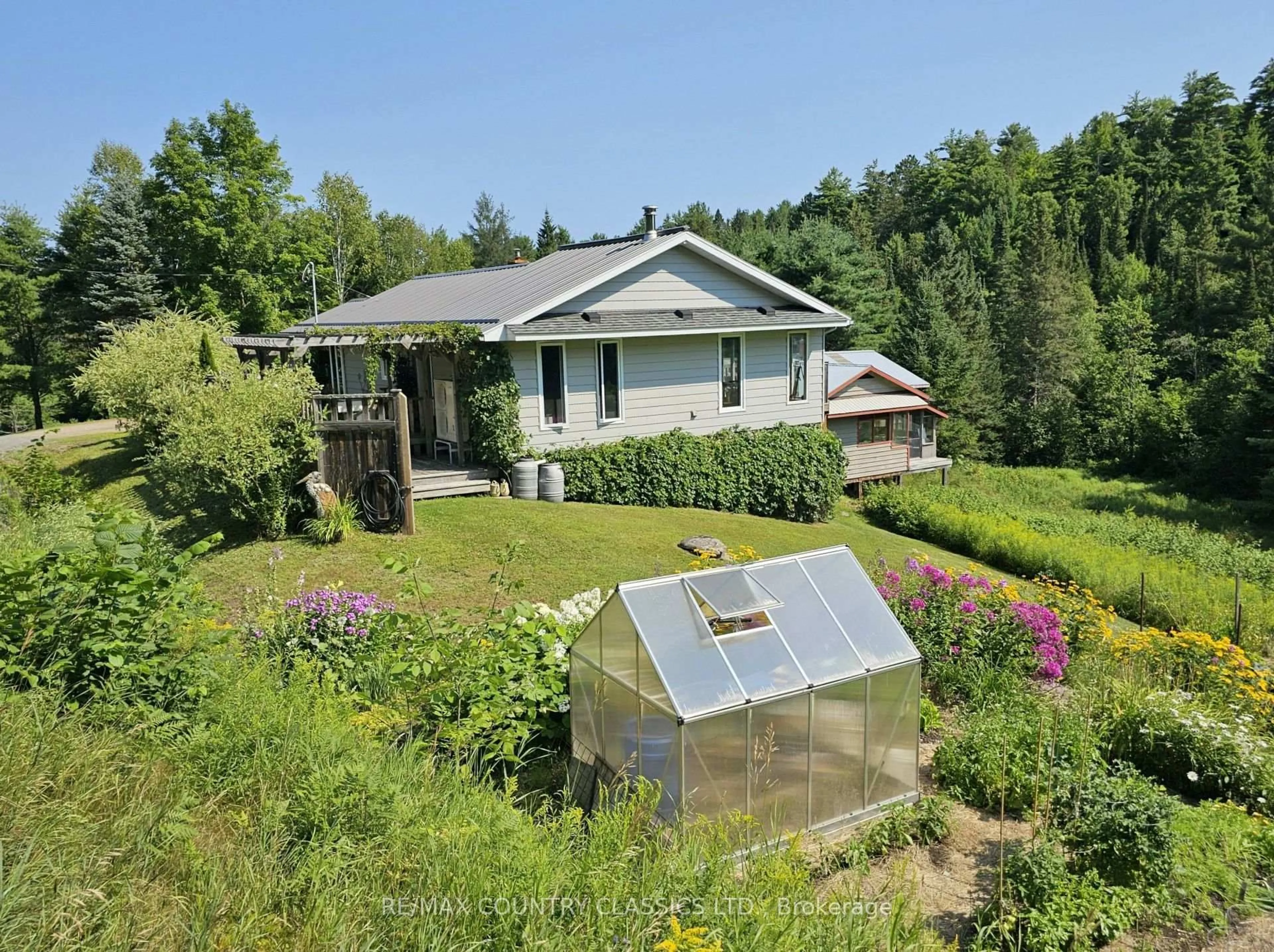 A pic from outside/outdoor area/front of a property/back of a property/a pic from drone, unknown for 888 Wilno South Rd, Wilno Ontario K0J 2N0