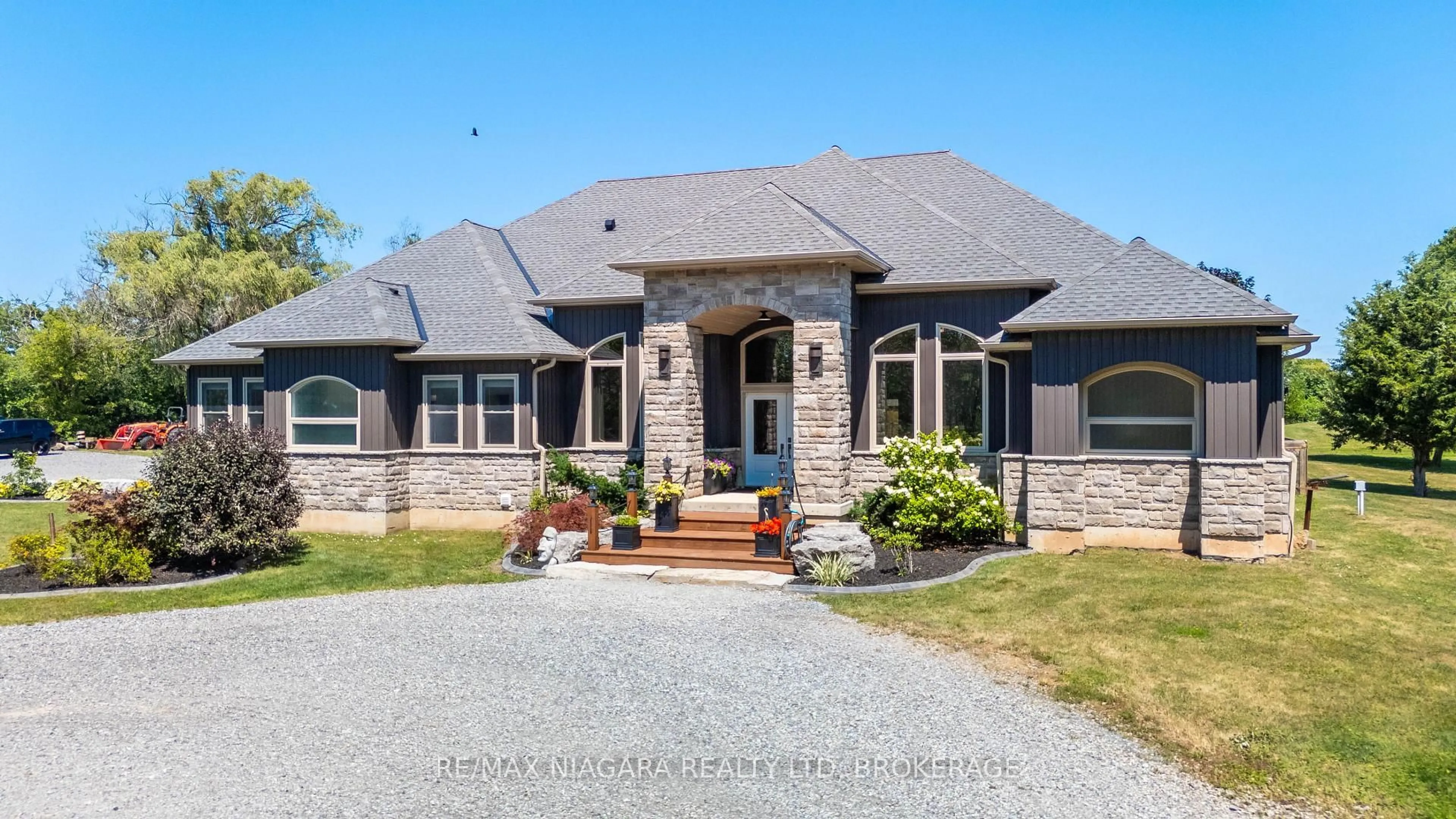 Home with brick exterior material, street for 2439 Miller Rd, Port Colborne Ontario L3K 5V5