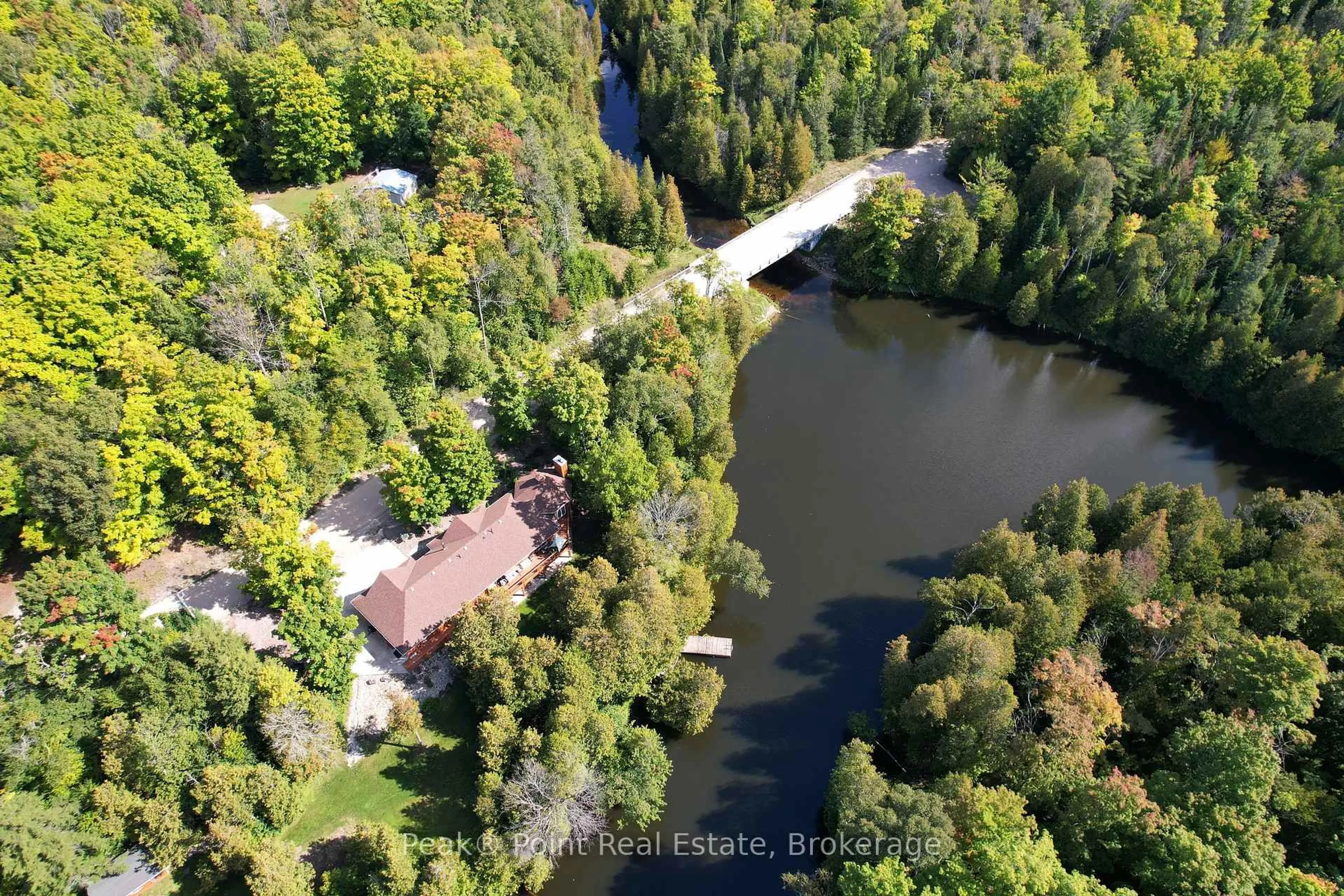 A pic from outside/outdoor area/front of a property/back of a property/a pic from drone, water/lake/river/ocean view for 38 Rankin Bridge Rd, South Bruce Peninsula Ontario N0H 2G0