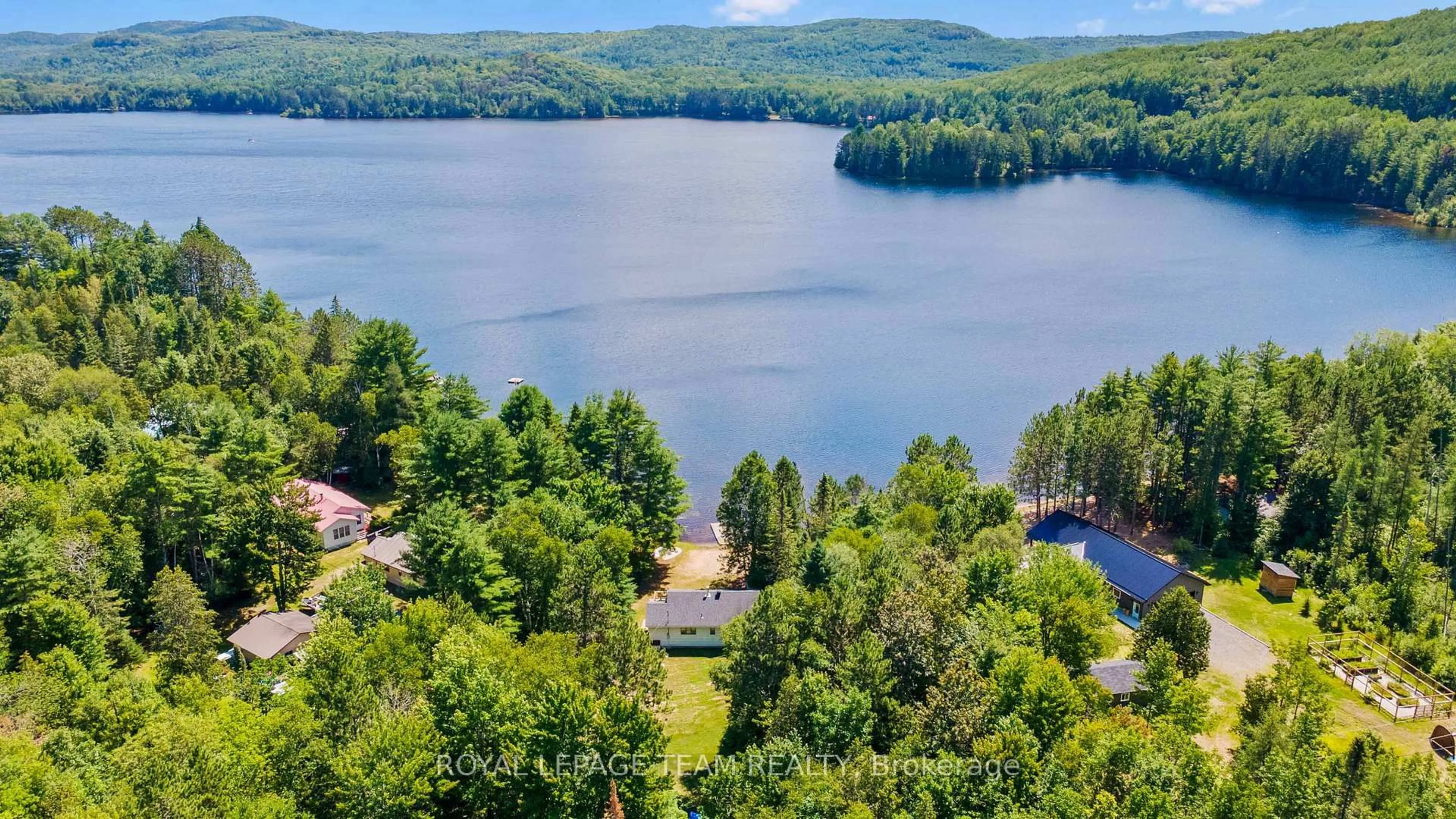 A pic from outside/outdoor area/front of a property/back of a property/a pic from drone, water/lake/river/ocean view for 302 Long Lake Rd, Barry's Bay Ontario K0J 1B0