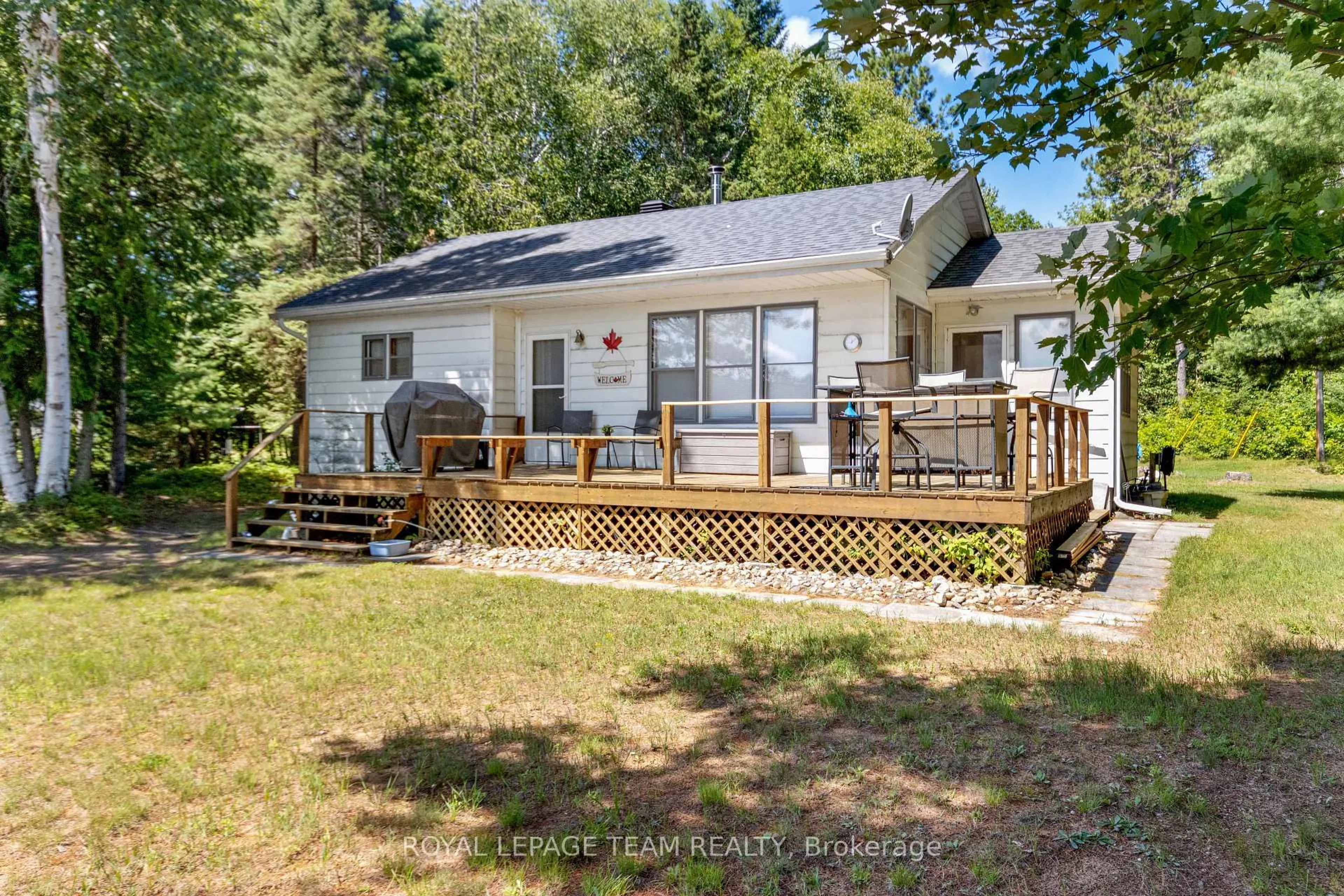 A pic from outside/outdoor area/front of a property/back of a property/a pic from drone, water/lake/river/ocean view for 302 Long Lake Rd, Barry's Bay Ontario K0J 1B0