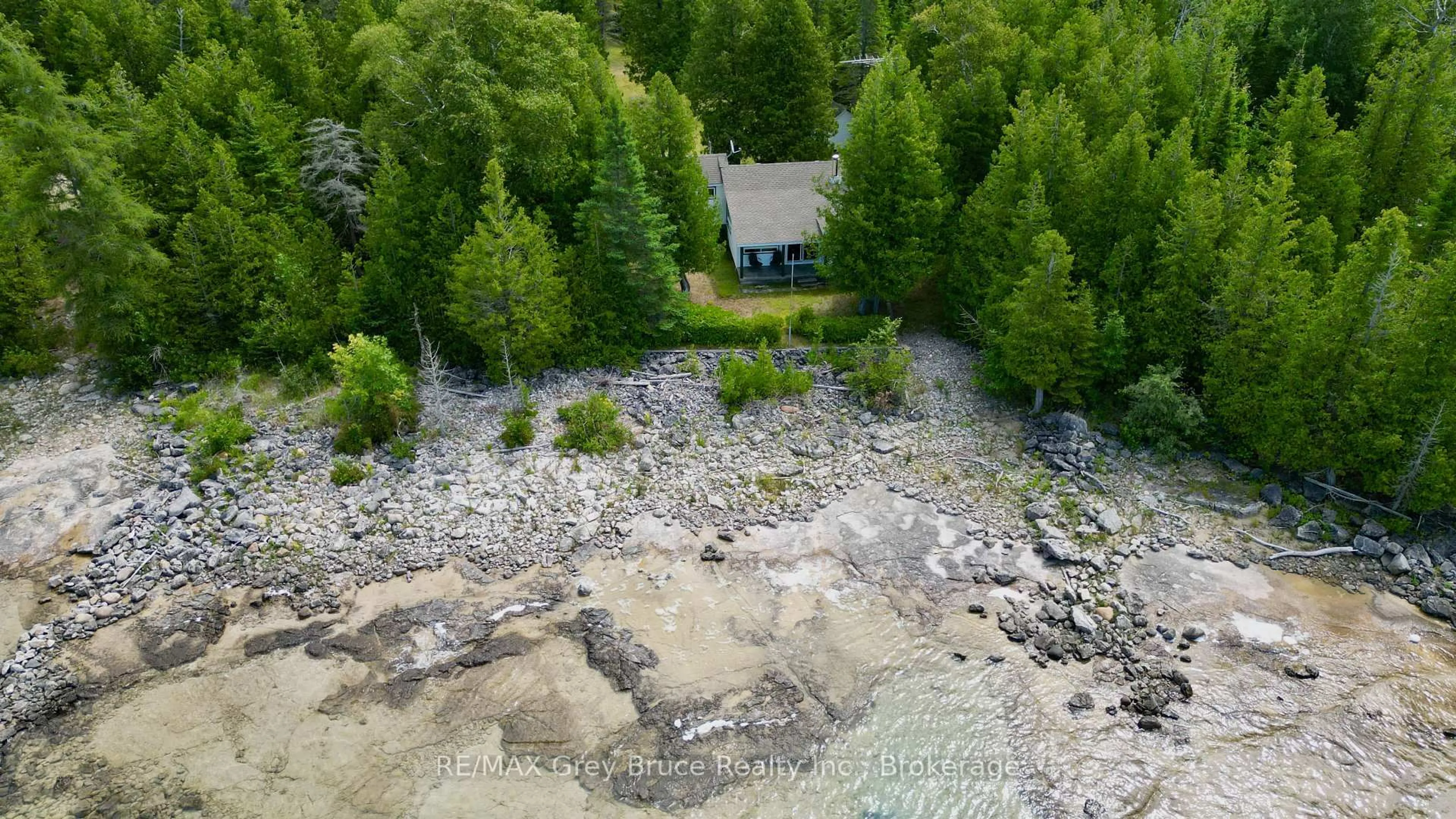 A pic from outside/outdoor area/front of a property/back of a property/a pic from drone, water/lake/river/ocean view for 123 Fowlie Rd, Northern Bruce Peninsula Ontario N0H 1W0