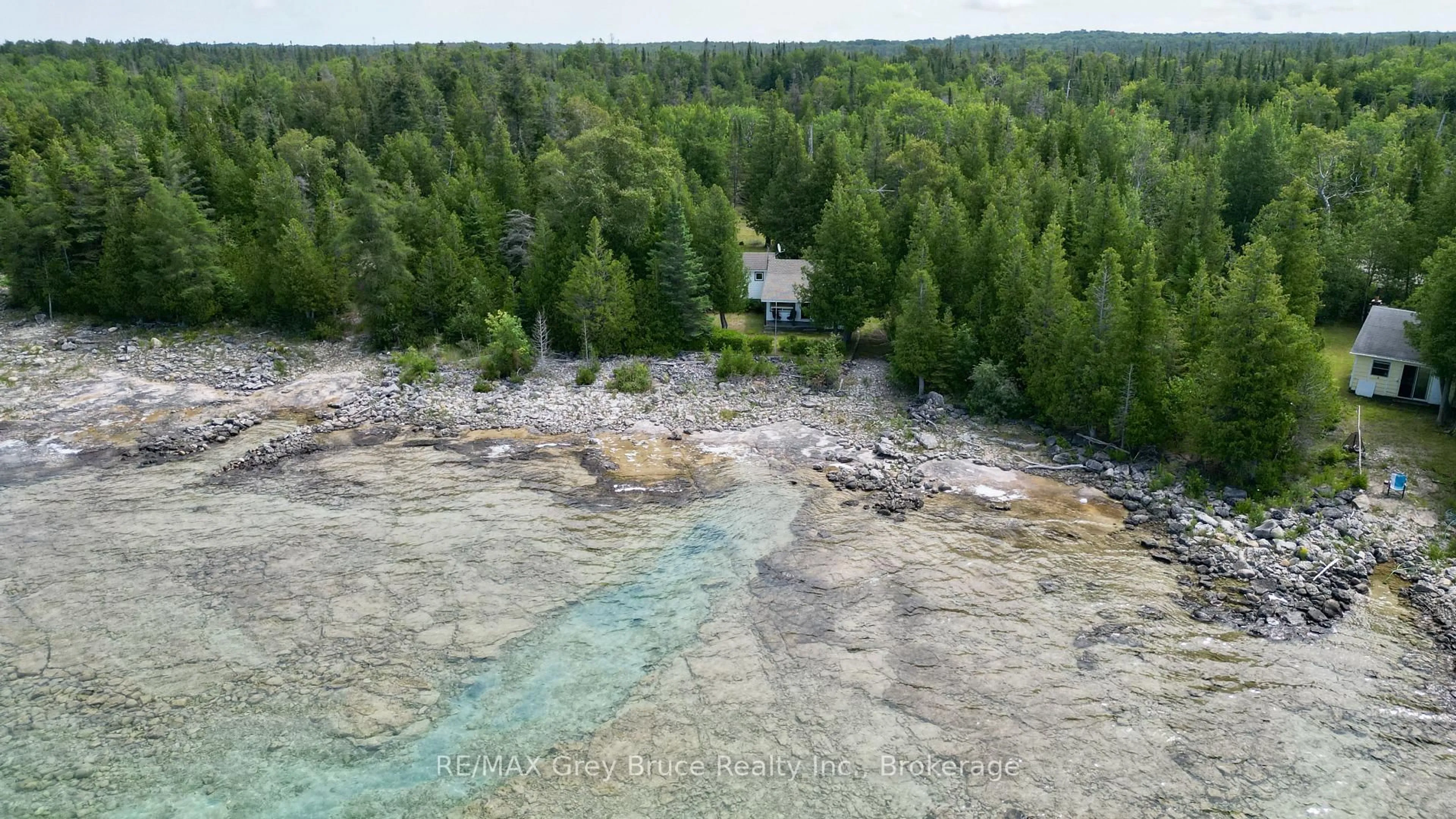A pic from outside/outdoor area/front of a property/back of a property/a pic from drone, water/lake/river/ocean view for 123 Fowlie Rd, Northern Bruce Peninsula Ontario N0H 1W0