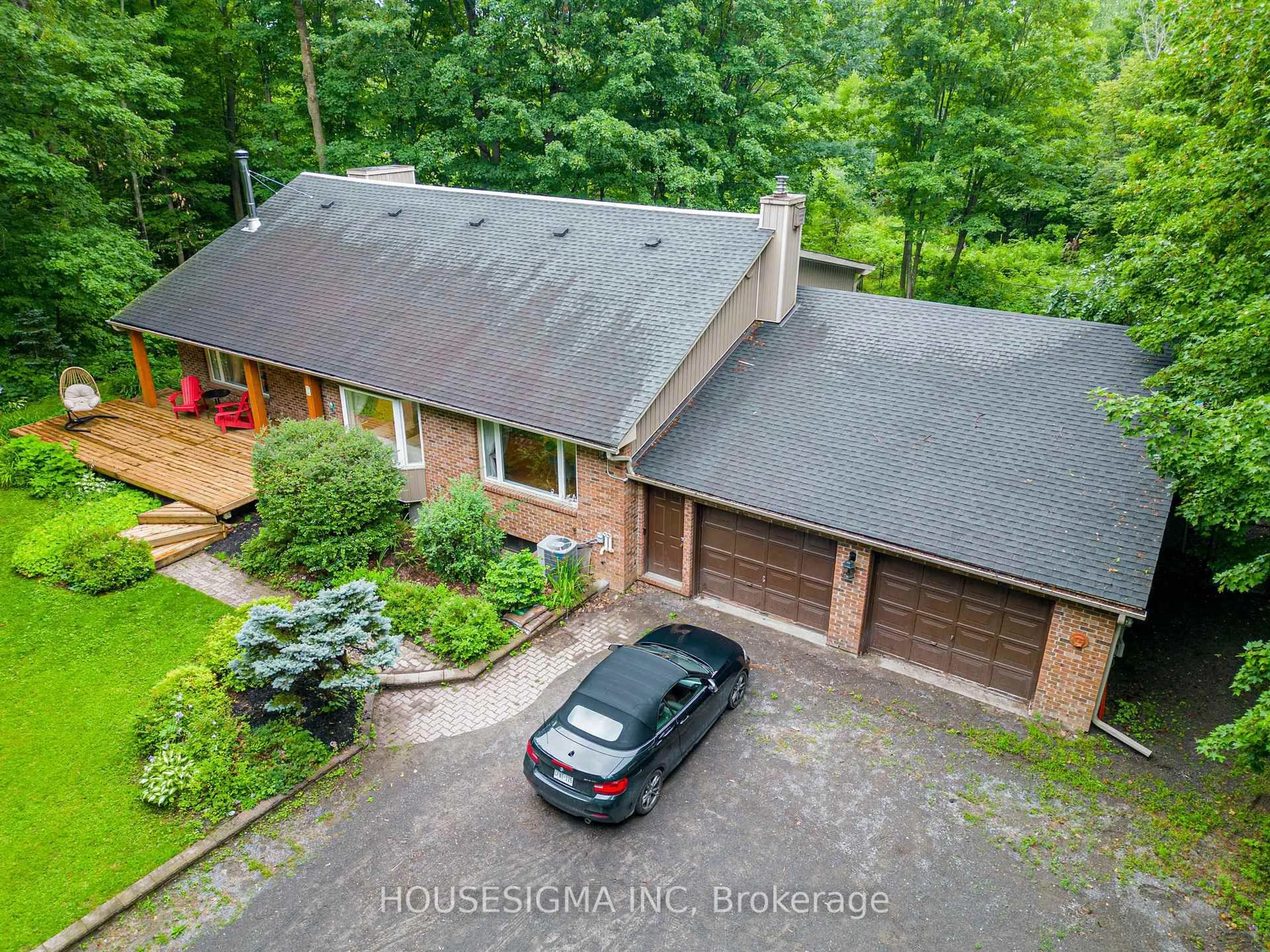 A pic from outside/outdoor area/front of a property/back of a property/a pic from drone, unknown for 1437 Huntmar Dr, Carp Ontario K0A 1L0
