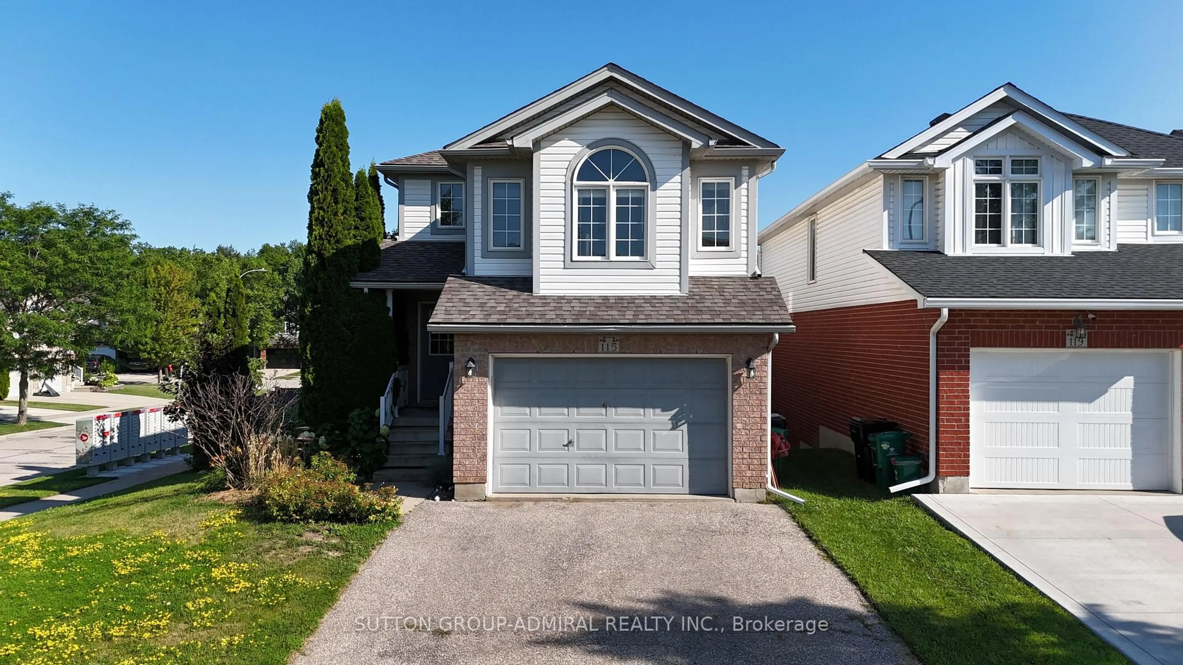 Home with vinyl exterior material, street for 115 PEACH BLOSSOM Cres, Kitchener Ontario N2E 3Z7