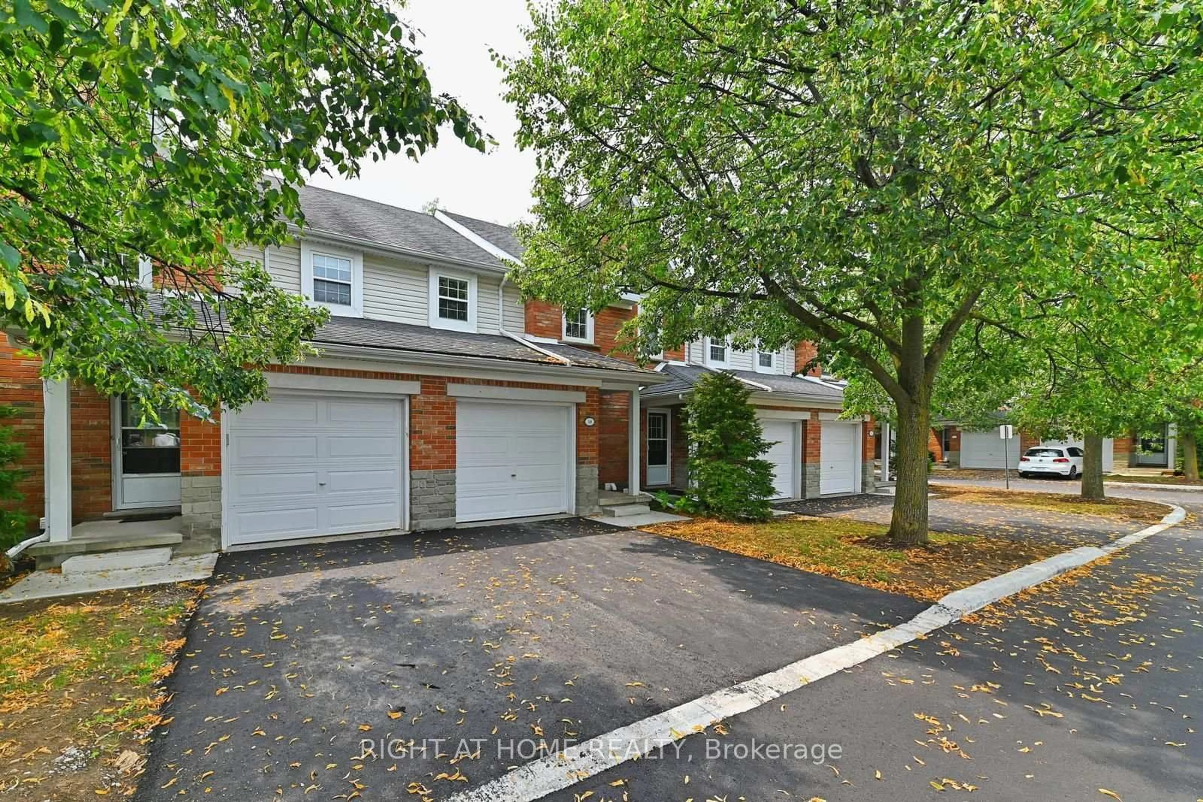 A pic from outside/outdoor area/front of a property/back of a property/a pic from drone, street for 1055 Gordon St #58, Guelph Ontario N1G 4X9