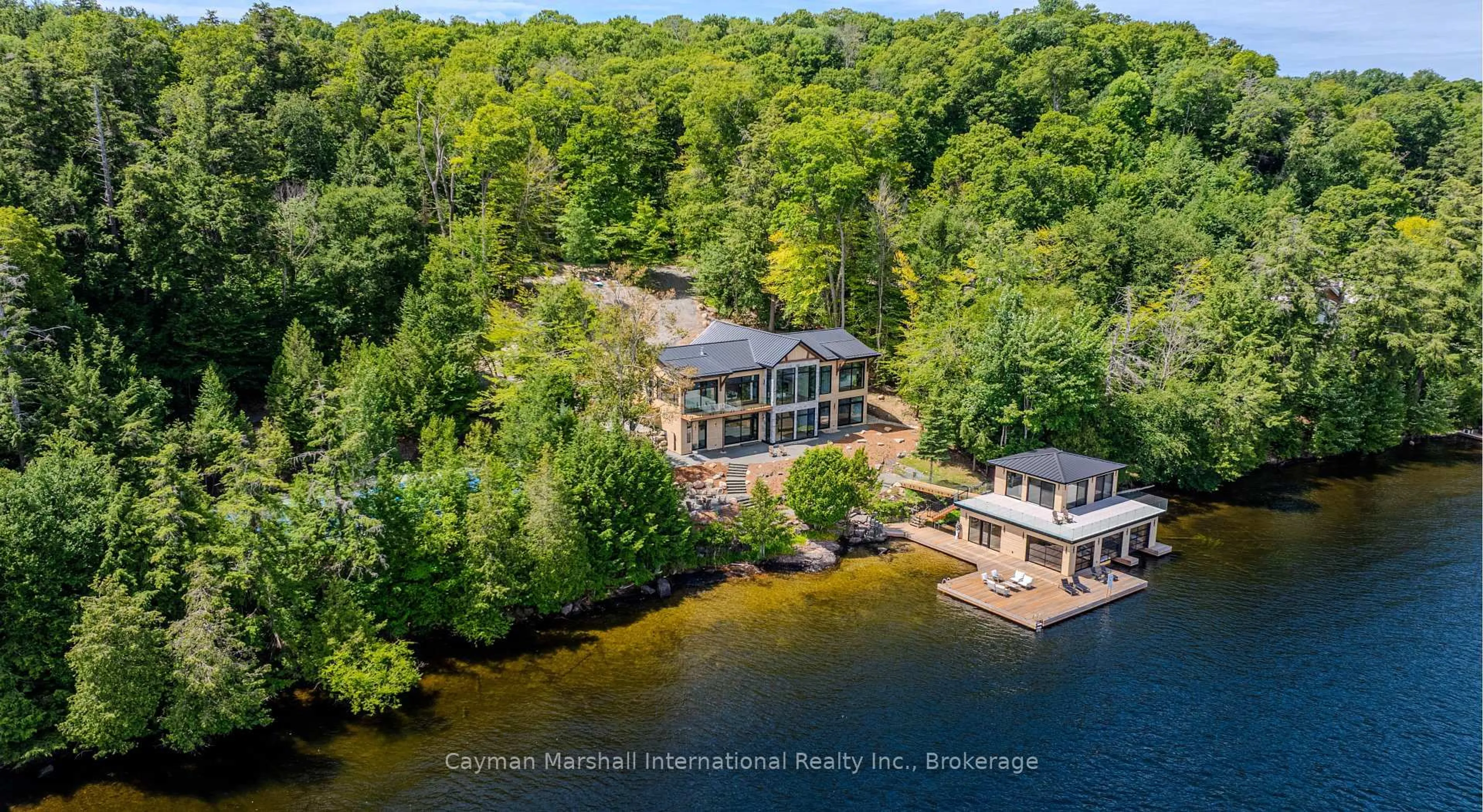 A pic from outside/outdoor area/front of a property/back of a property/a pic from drone, water/lake/river/ocean view for 1405 Juddhaven Rd Rd #32, Muskoka Lakes Ontario P0B 1J0
