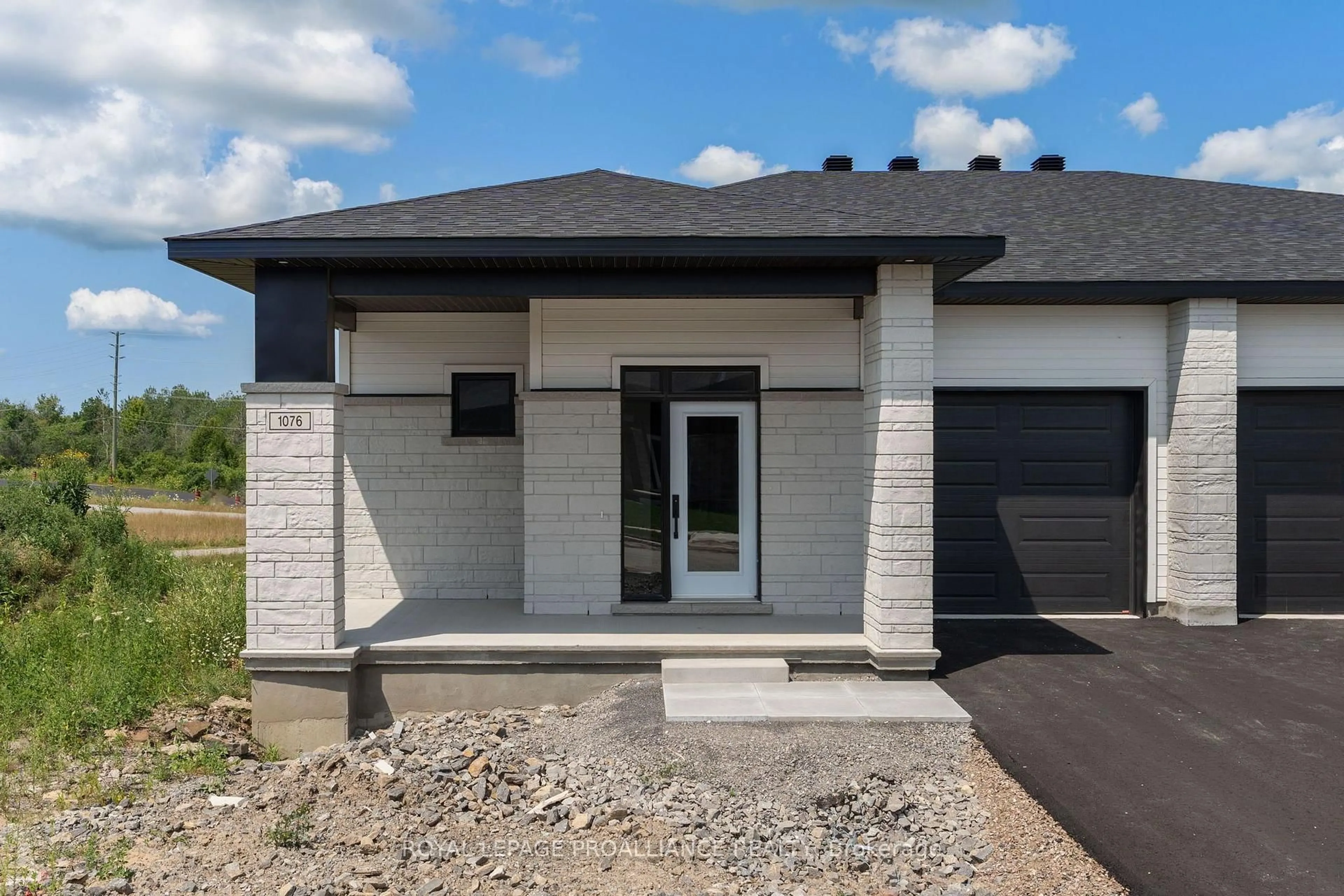 Home with brick exterior material, street for 1076 Moore St, Brockville Ontario K0E 0H2