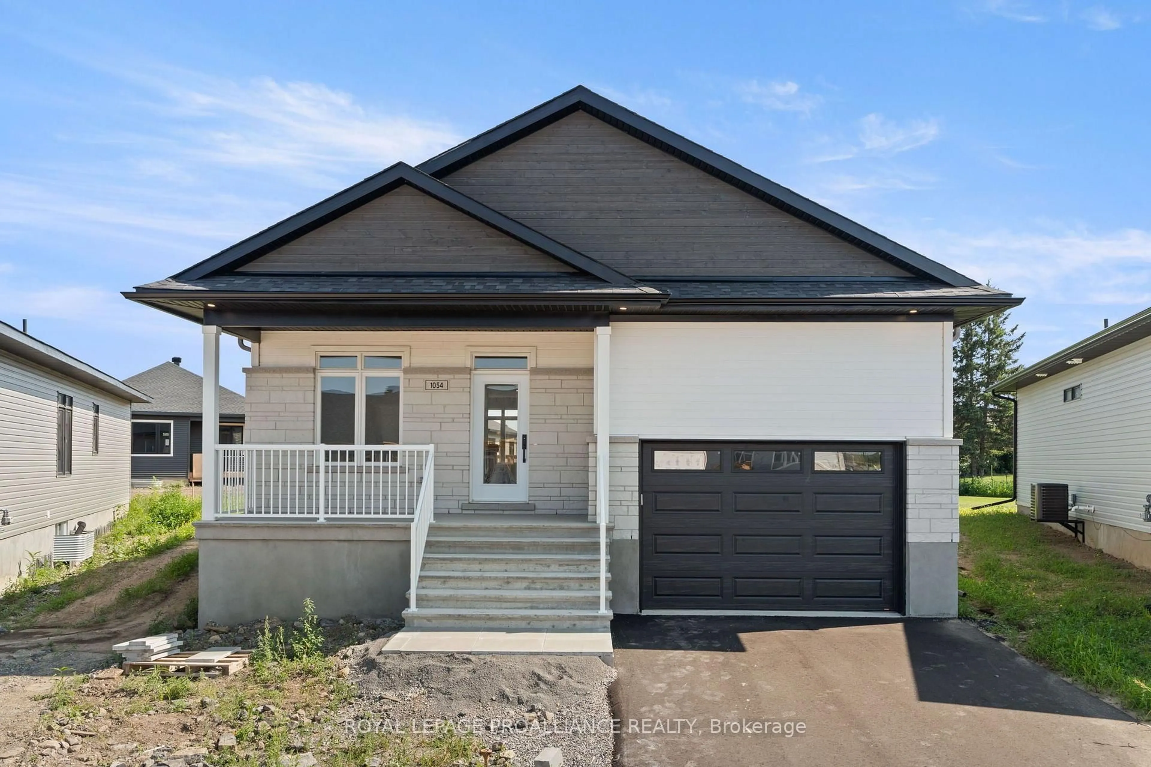 Home with vinyl exterior material, street for 1054 Turner Dr, Brockville Ontario K6V 0G8