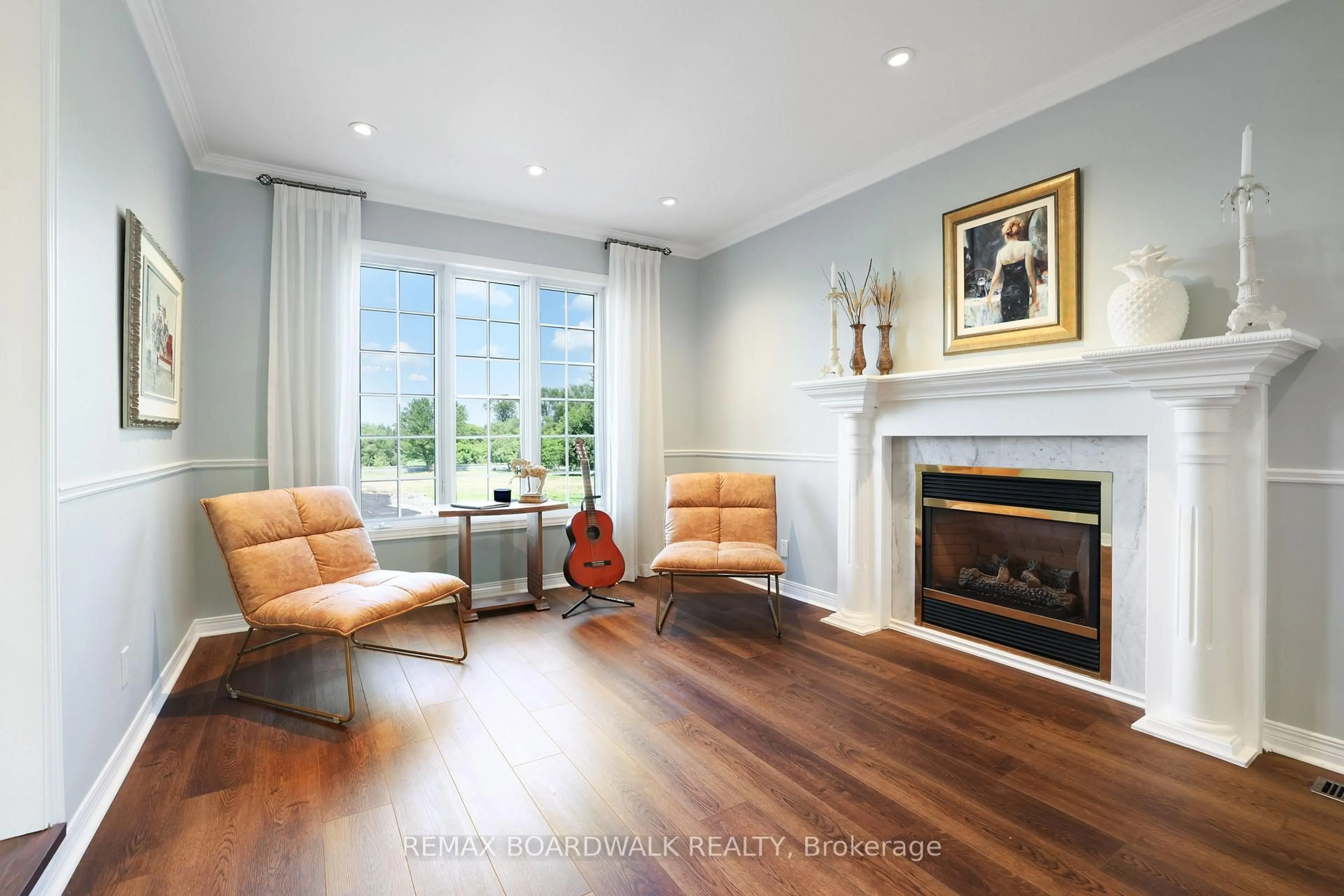 Living room with furniture, wood/laminate floor for 1375 March Vall MARCH VALLEY Rd, Ottawa Ontario K2K 1X7