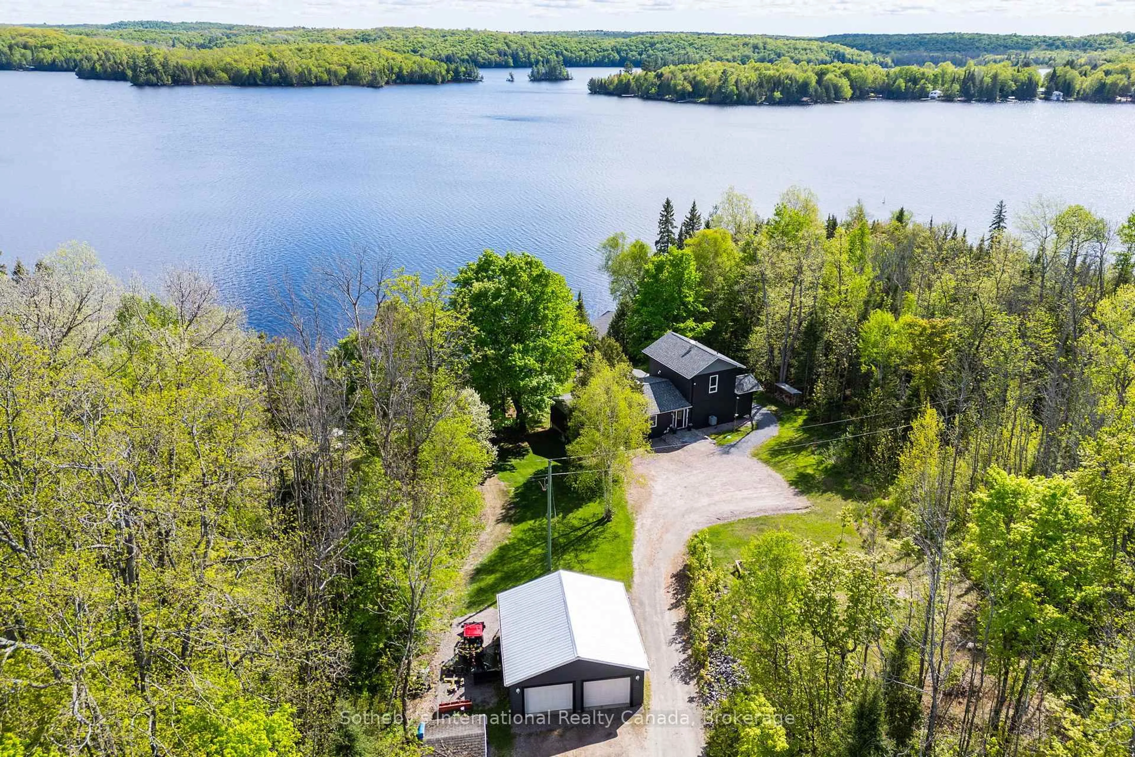 A pic from outside/outdoor area/front of a property/back of a property/a pic from drone, water/lake/river/ocean view for 126 CHAPMAN Dr, Magnetawan Ontario P0A 1P0