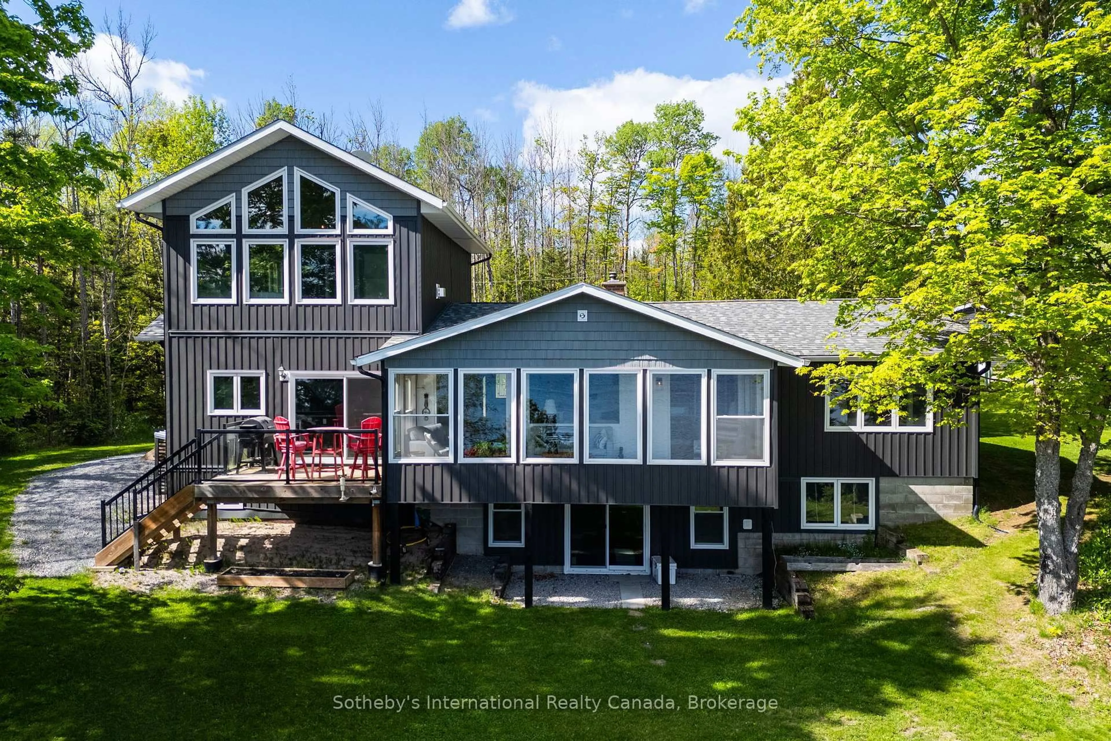 A pic from outside/outdoor area/front of a property/back of a property/a pic from drone, water/lake/river/ocean view for 126 CHAPMAN Dr, Magnetawan Ontario P0A 1P0