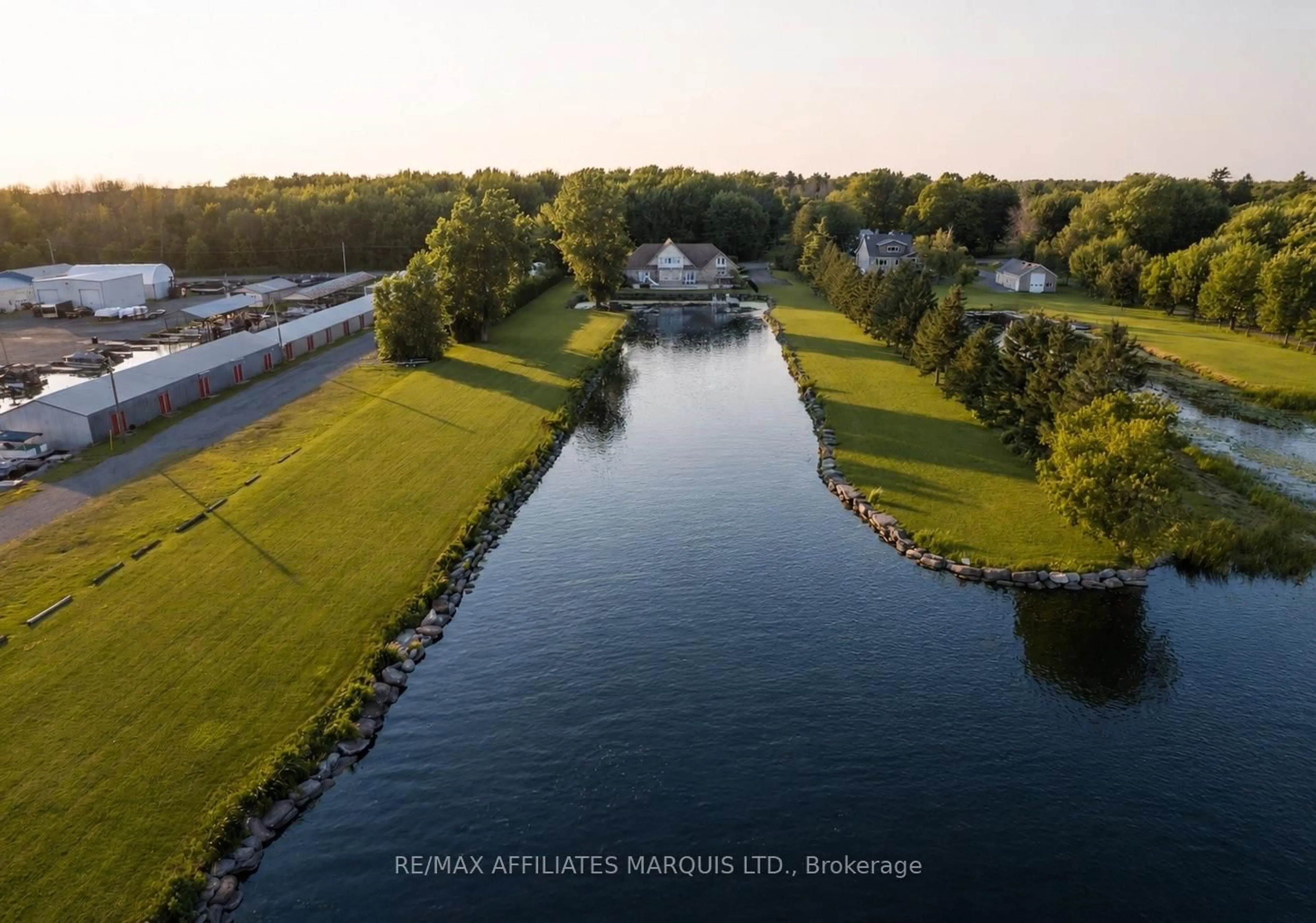 A pic from outside/outdoor area/front of a property/back of a property/a pic from drone, water/lake/river/ocean view for 20190 COUNTY RD 2 Rd, South Glengarry Ontario K0C 2C0