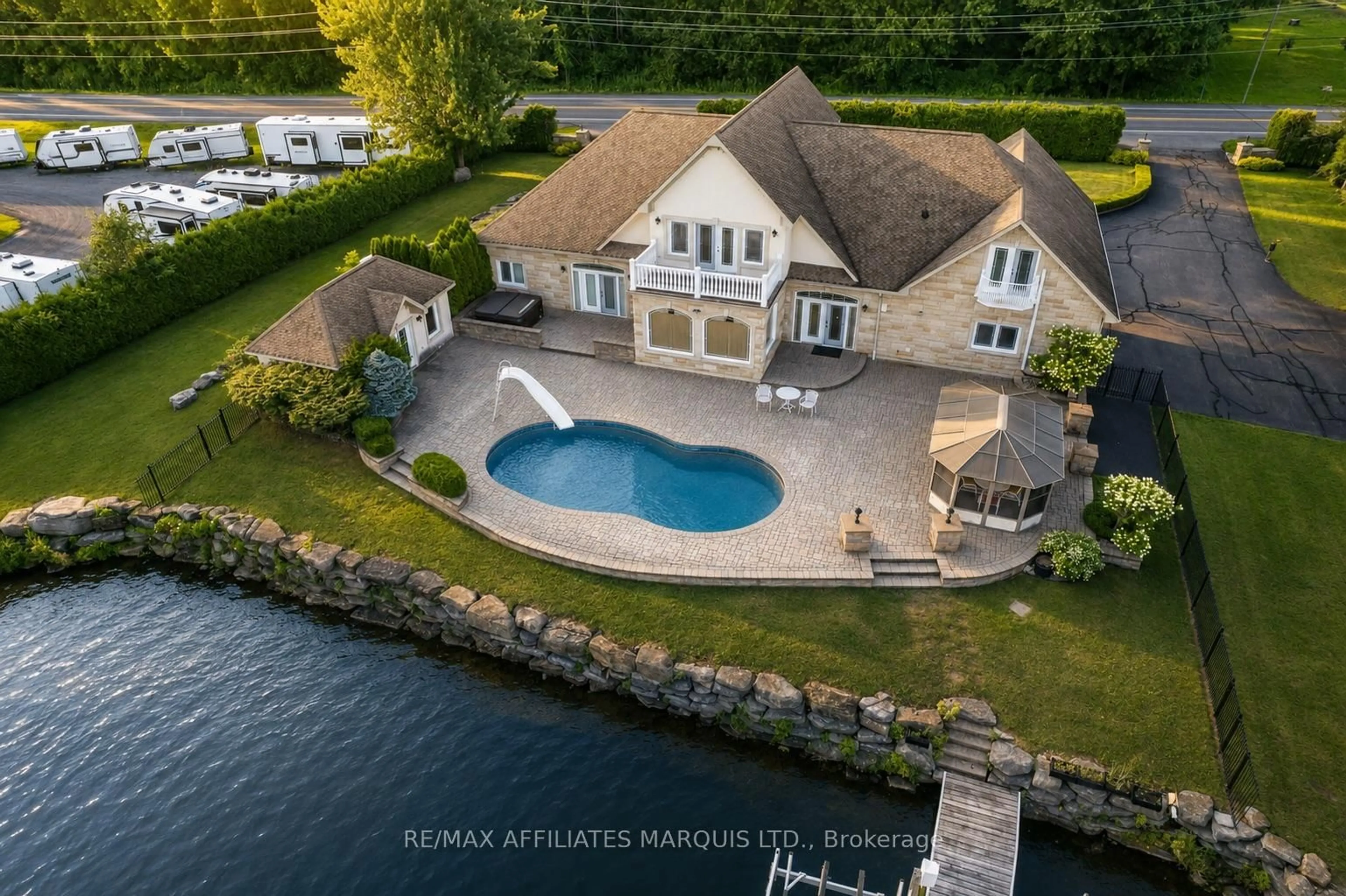 A pic from outside/outdoor area/front of a property/back of a property/a pic from drone, water/lake/river/ocean view for 20190 COUNTY RD 2 Rd, South Glengarry Ontario K0C 2C0