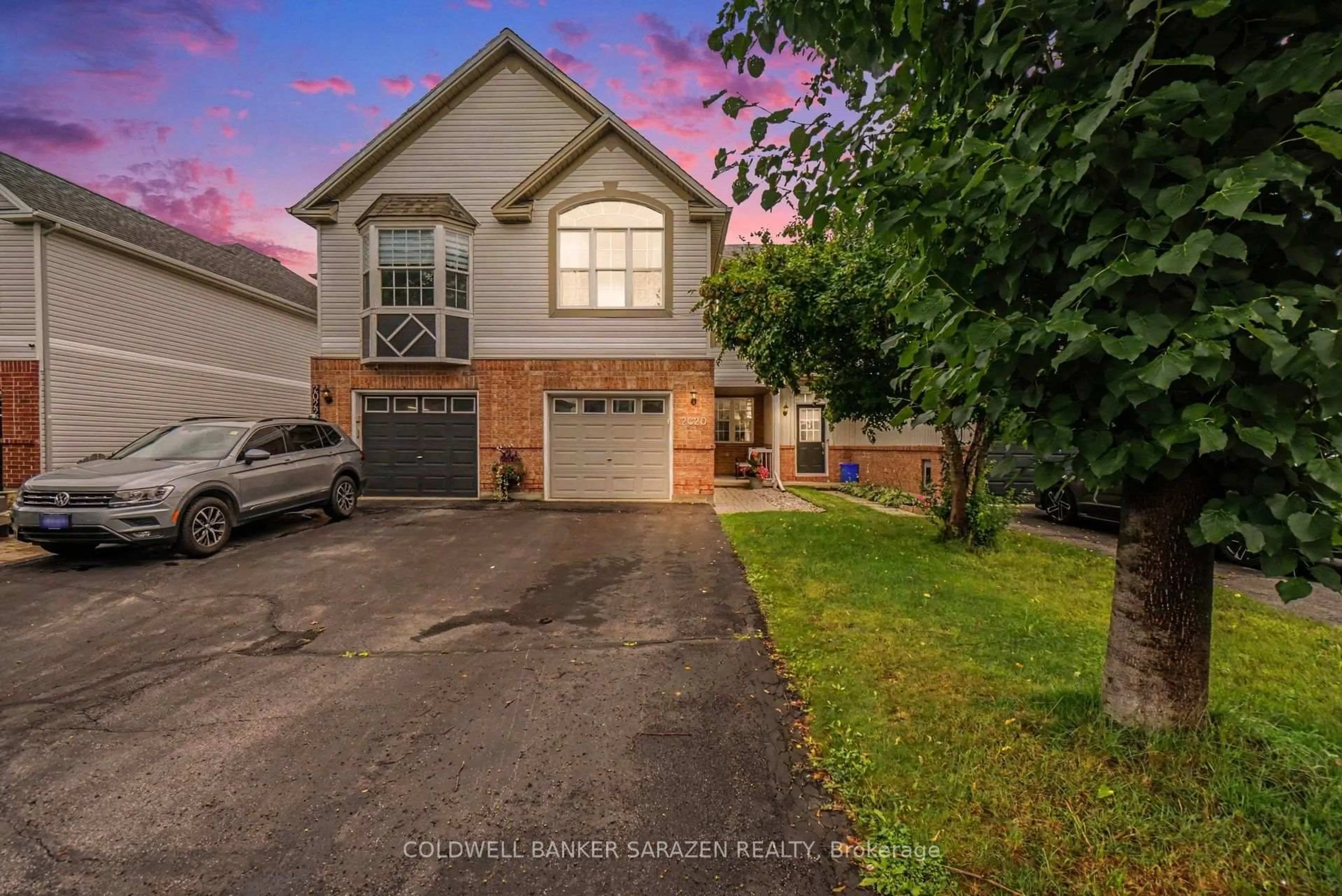Home with vinyl exterior material, street for 2020 Breezewood St, Ottawa Ontario K4A 4S6