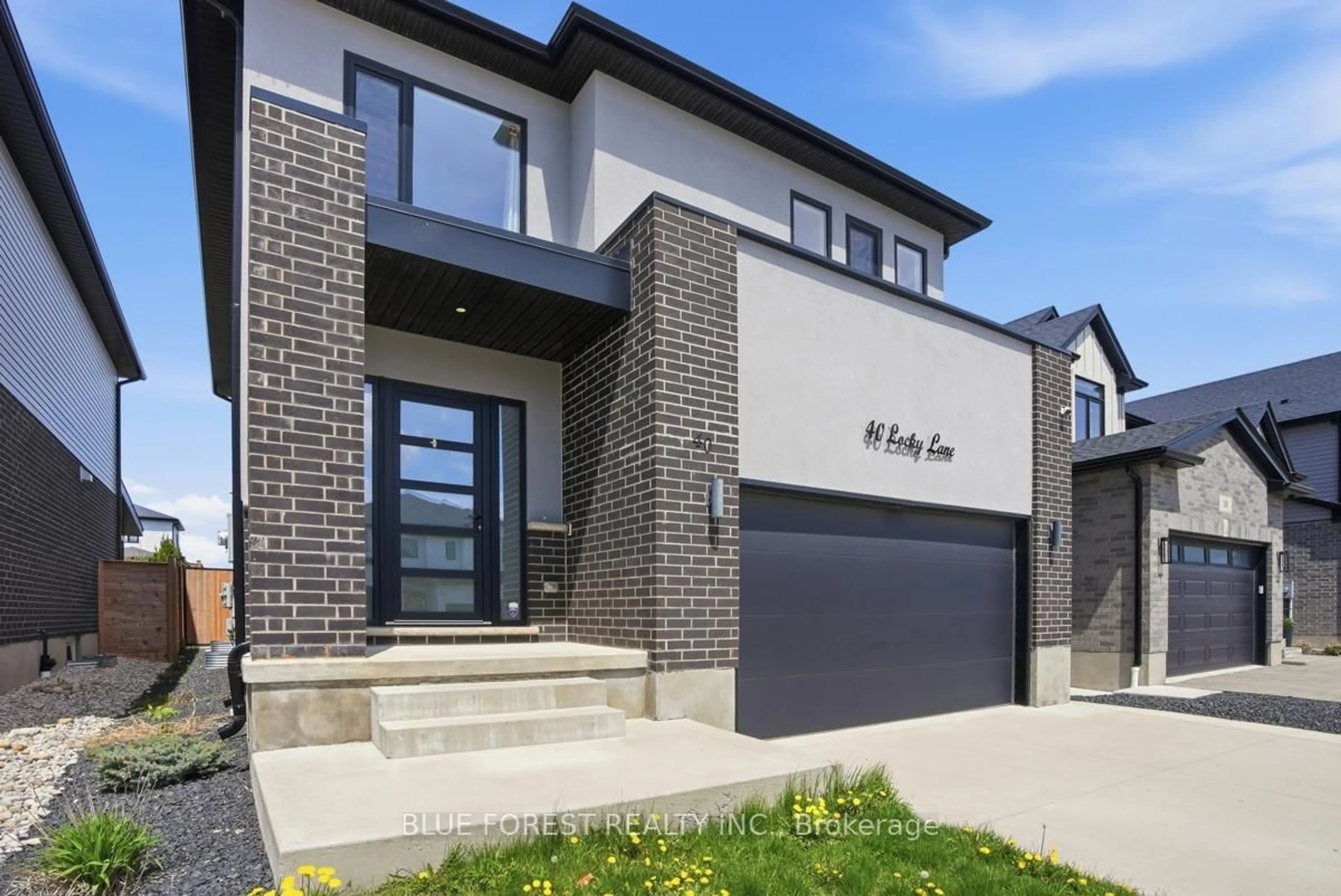Home with brick exterior material, street for 40 Locky Lane, Middlesex Centre Ontario N0L 1R0