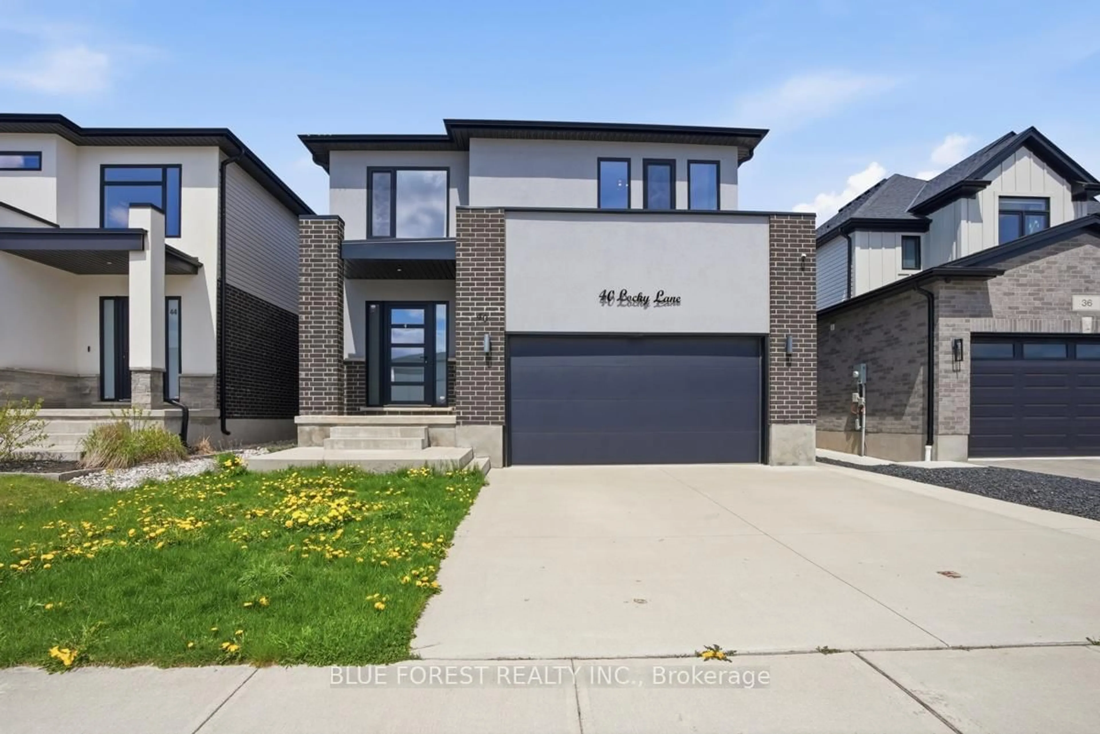 Home with brick exterior material, street for 40 Locky Lane, Middlesex Centre Ontario N0L 1R0