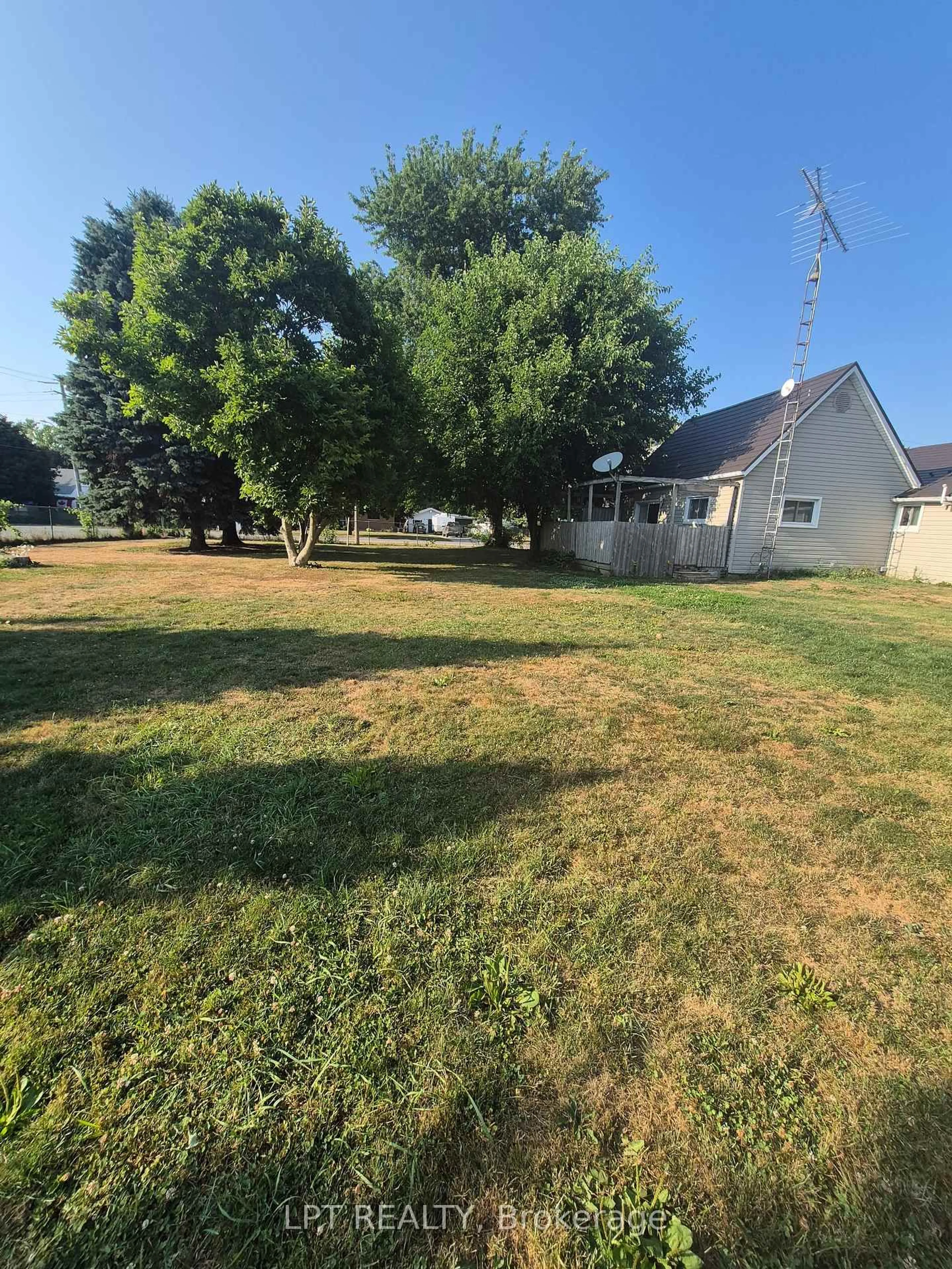 A pic from outside/outdoor area/front of a property/back of a property/a pic from drone, street for 19 John Park Line #Tupperville, Chatham-Kent Ontario N0P 2M0