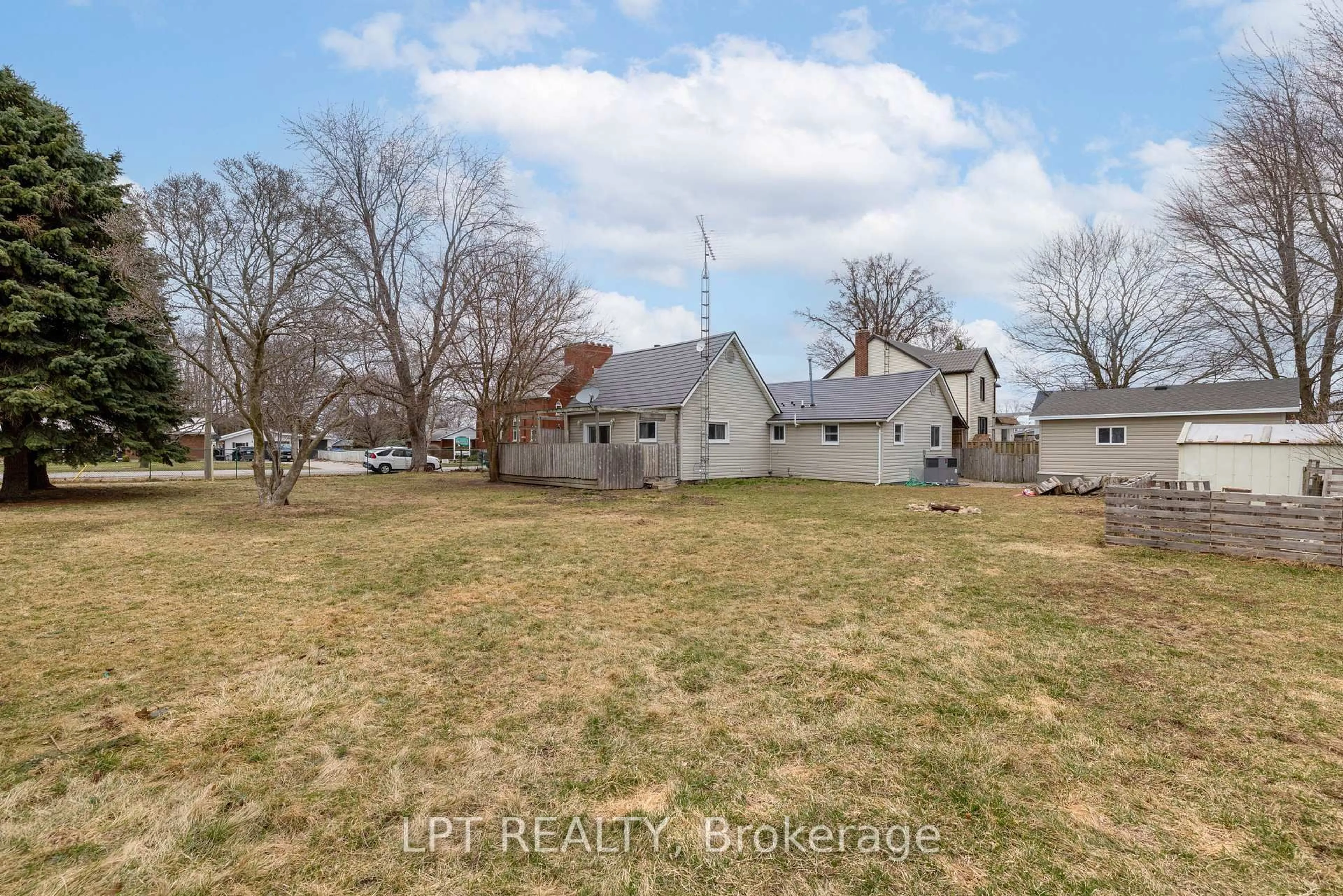 A pic from outside/outdoor area/front of a property/back of a property/a pic from drone, unknown for 19 John Park Line #Tupperville, Chatham-Kent Ontario N0P 2M0