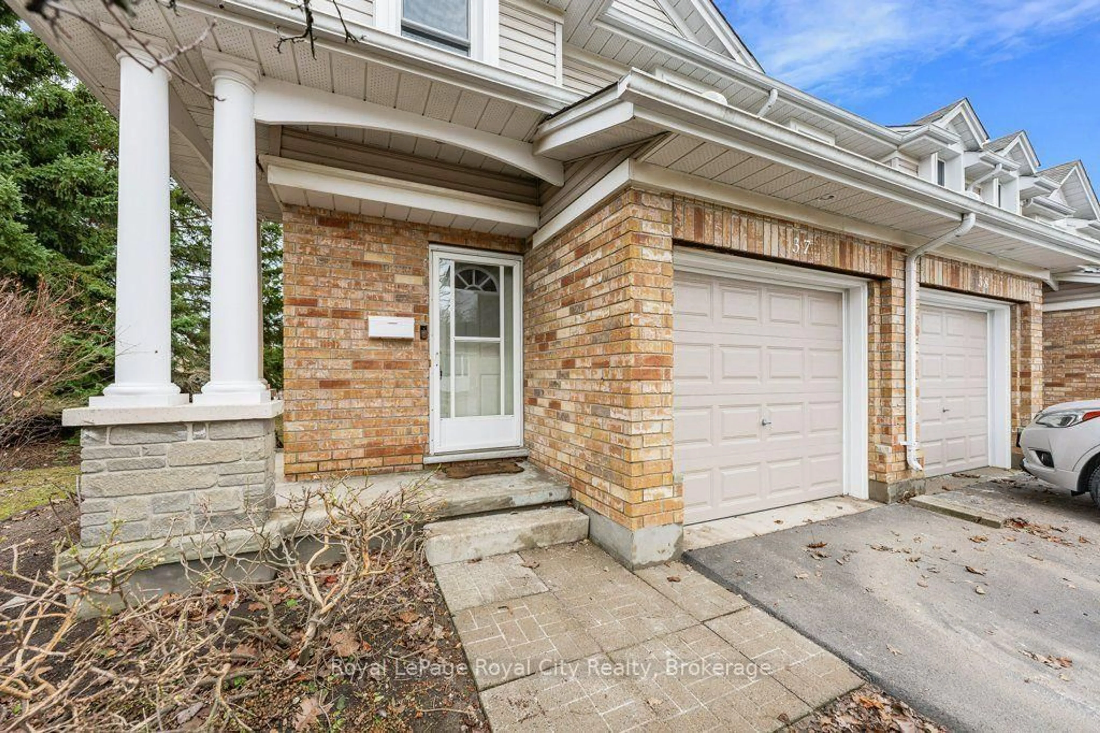 Home with brick exterior material, street for 66 Rodgers Rd #37, Guelph Ontario N1G 4Y5
